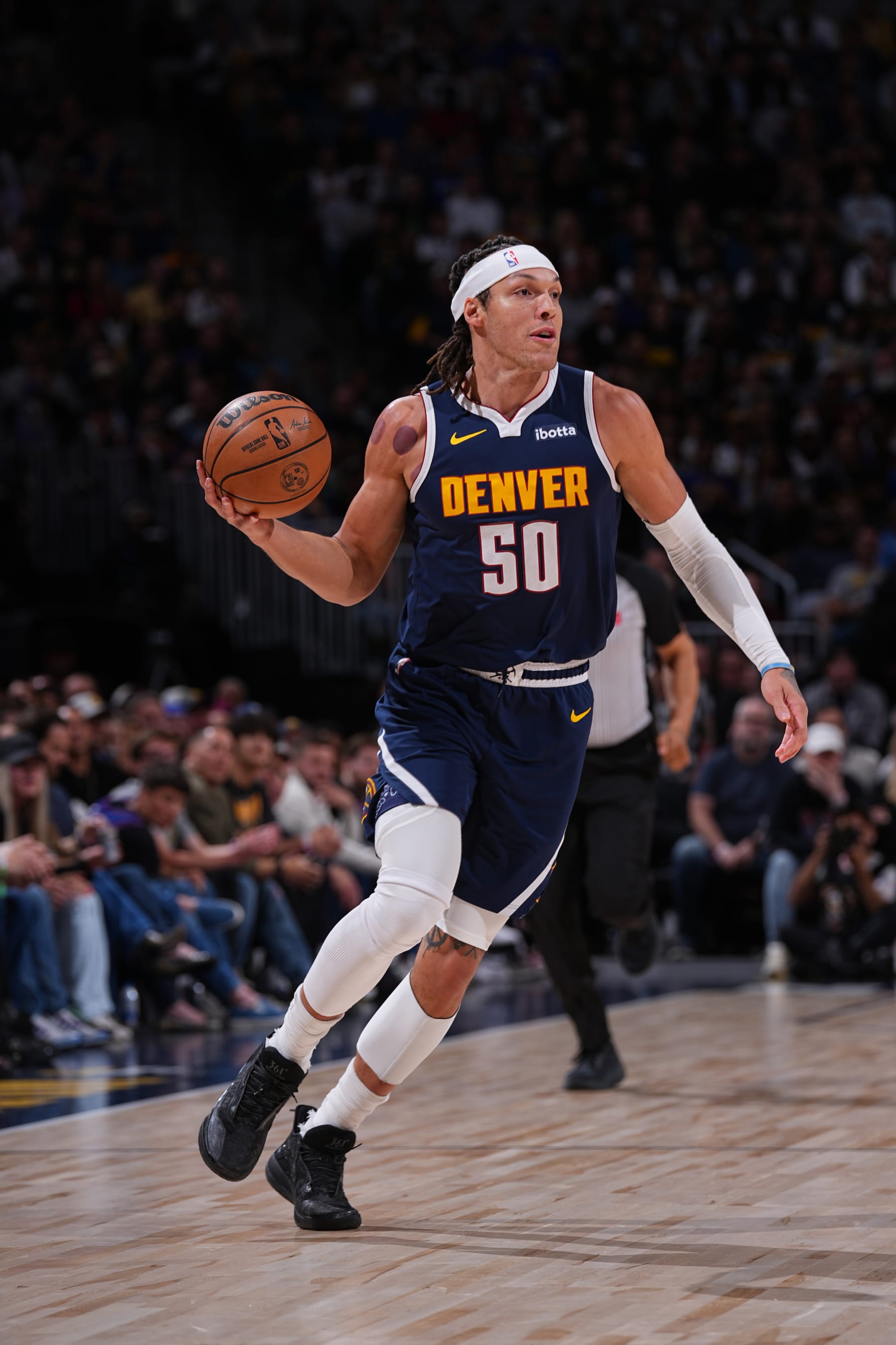 DENVER, CO - APRIL 10: Aaron Gordon #50 of the Denver Nuggets handles the ball during the game against the Minnesota Timberwolves on April 10, 2024 at the Ball Arena in Denver, Colorado. NOTE TO USER: User expressly acknowledges and agrees that, by downloading and/or using this Photograph, user is consenting to the terms and conditions of the Getty Images License Agreement. Mandatory Copyright Notice: Copyright 2024 NBAE (Photo by Bart Young/NBAE via Getty Images)