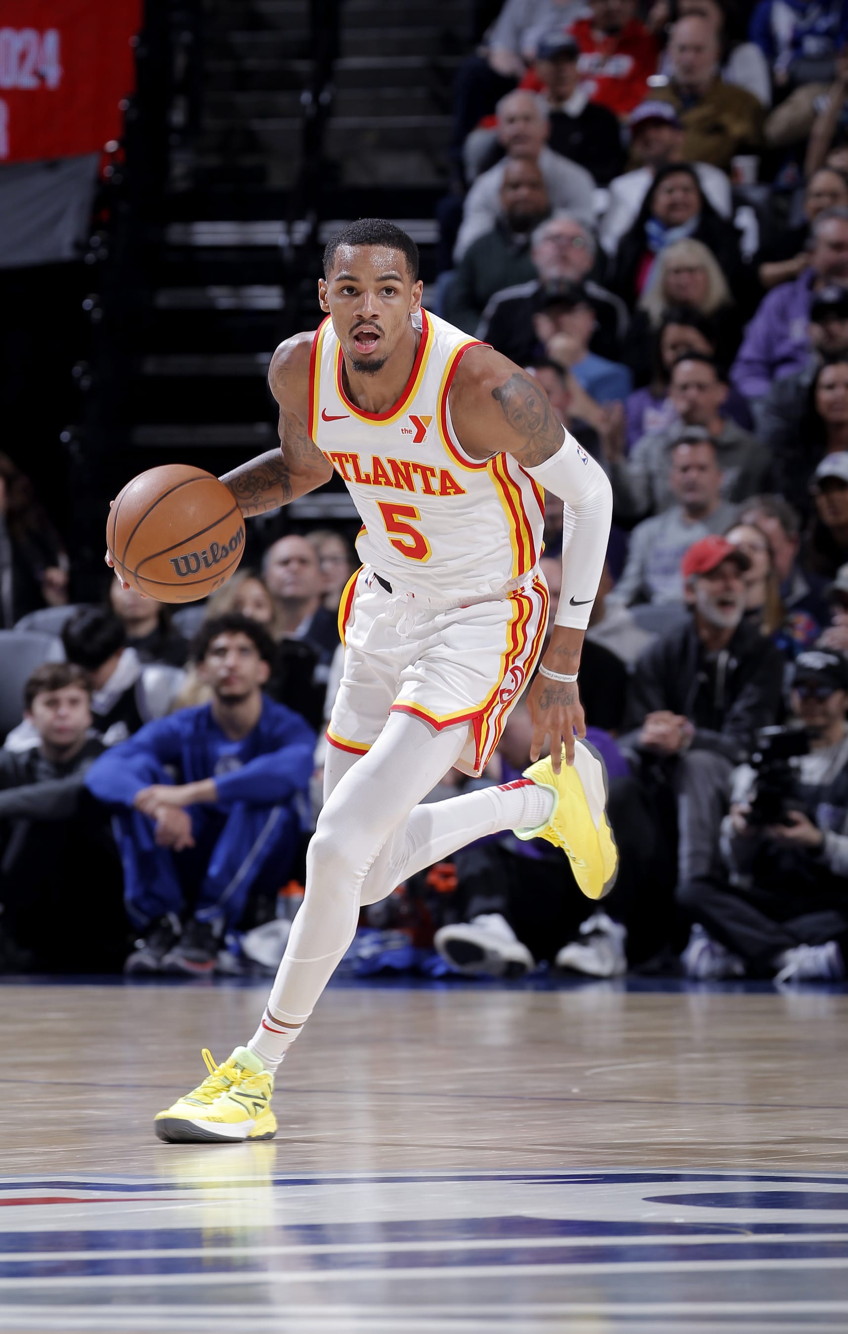 SACRAMENTO, CA - JANUARY 22: Dejounte Murray #5 of the Atlanta Hawks brings the ball up the court during the game against the Sacramento Kings on January 22, 2024 at Golden 1 Center in Sacramento, California. NOTE TO USER: User expressly acknowledges and agrees that, by downloading and or using this photograph, User is consenting to the terms and conditions of the Getty Images Agreement. Mandatory Copyright Notice: Copyright 2024 NBAE (Photo by Rocky Widner/NBAE via Getty Images)