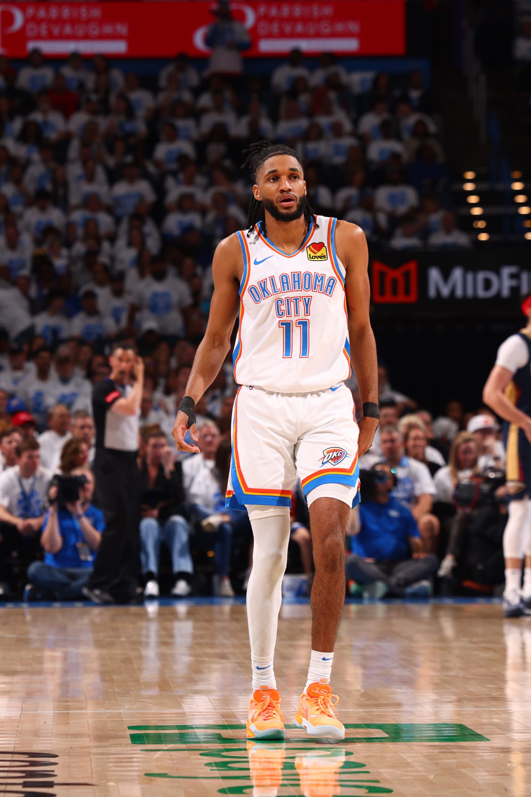 OKLAHOMA CITY, OK - APRIL 21:  Isaiah Joe #11 of the Oklahoma City Thunder looks on during the game against the New Orleans Pelicans  during Round 1 Game 1 of the 2024 NBA Playoffs on April 21, 2024 at Paycom Arena in Oklahoma City, Oklahoma. NOTE TO USER: User expressly acknowledges and agrees that, by downloading and or using this photograph, User is consenting to the terms and conditions of the Getty Images License Agreement. Mandatory Copyright Notice: Copyright 2024 NBAE (Photo by Zach Beeker/NBAE via Getty Images)