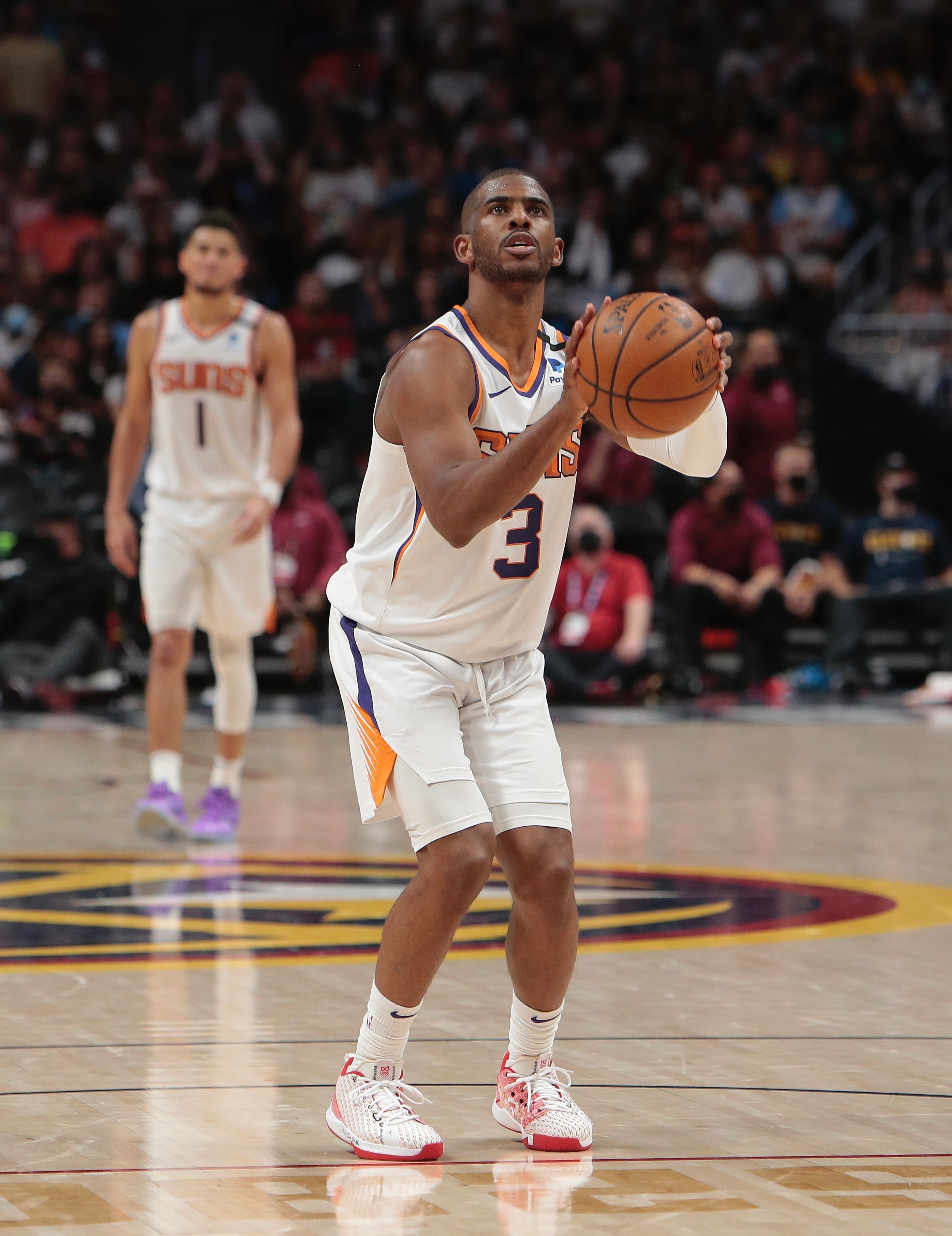 DENVER, CO - JUNE 13: Chris Paul #3 of the Phoenix Suns shoots a free throw against the Denver Nuggets during Round 2, Game 4 of the 2021 NBA Playoffs on June 13, 2021 at the Ball Arena in Denver, Colorado. NOTE TO USER: User expressly acknowledges and agrees that, by downloading and/or using this Photograph, user is consenting to the terms and conditions of the Getty Images License Agreement. Mandatory Copyright Notice: Copyright 2021 NBAE (Photo by Jim Poorten/NBAE via Getty Images)