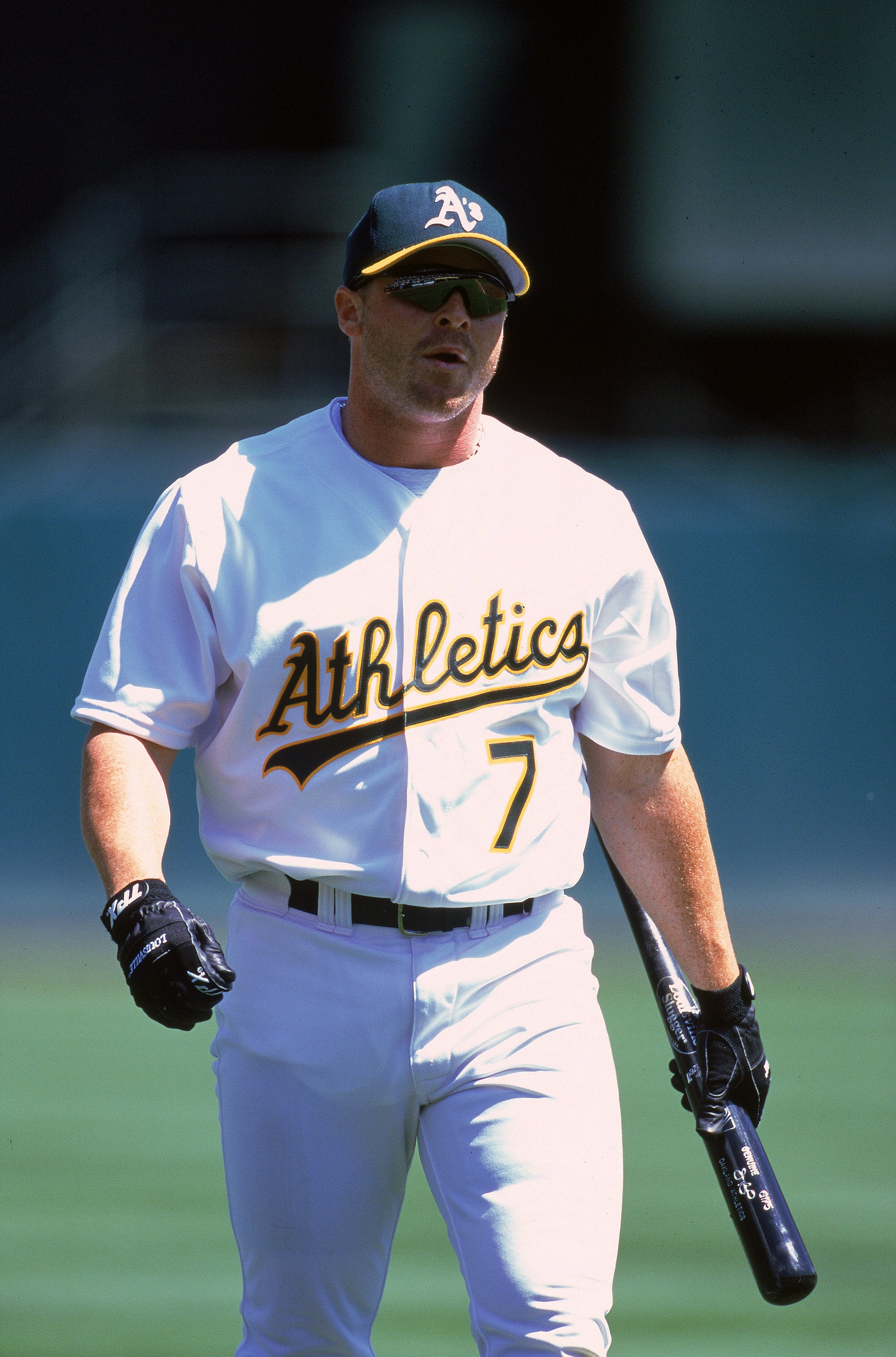 9 Apr 2000: Jeremy Giambi #7 of the Oakland Athletics walks on the field during a game against the Chicago White Sox at the Network Associates Coliseum in Oakland, California. The Athletics defeated the White Sox 14-2. Mandatory Credit: Jed Jacobsohn  /Allsport