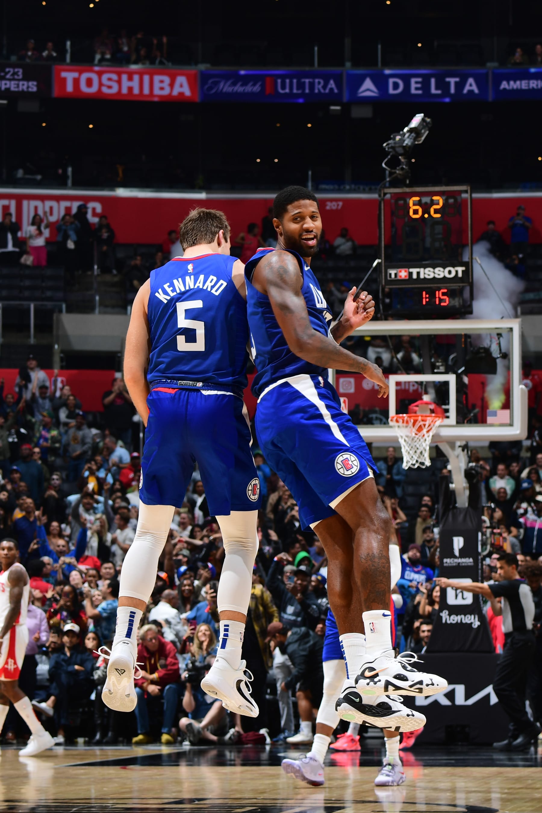 LOS ANGELES, CA - OCTOBER 31: Paul George #13 and Luke Kennard #5 of the LA Clippers celebrate the game winning shot during the game against the Houston Rockets on October 31, 2022 at Crypto.Com Arena in Los Angeles, California. NOTE TO USER: User expressly acknowledges and agrees that, by downloading and/or using this Photograph, user is consenting to the terms and conditions of the Getty Images License Agreement. Mandatory Copyright Notice: Copyright 2022 NBAE (Photo by Adam Pantozzi/NBAE via Getty Images)