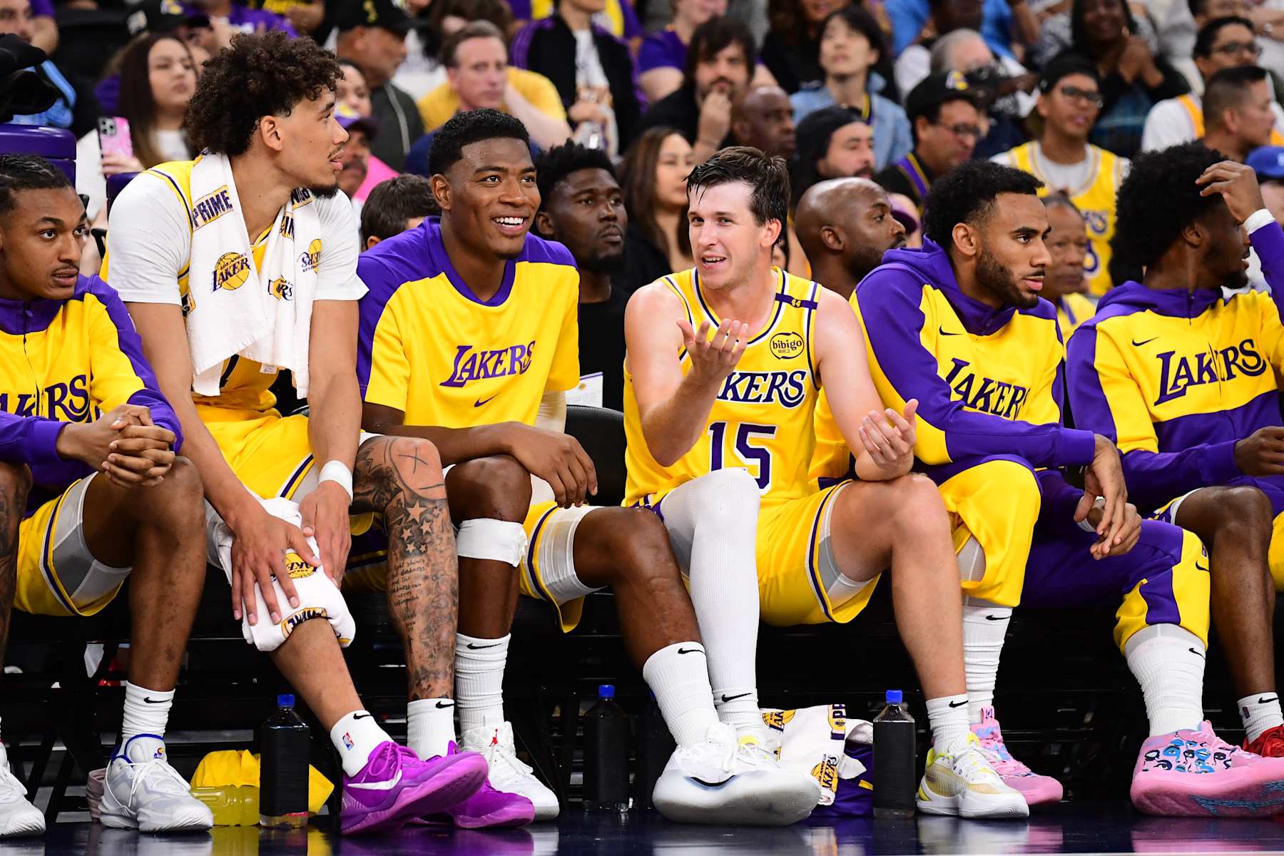 PALM SPRINGS, CA - OCTOBER 4: Austin Reaves #15  and Rui Hachimura #28 of the Los Angeles Lakers sit on the bench during the game against the Minnesota Timberwolves during an NBA preseason game on October 4, 2024 at Acrisure Arena in Palm Springs, California. NOTE TO USER: User expressly acknowledges and agrees that, by downloading and/or using this Photograph, user is consenting to the terms and conditions of the Getty Images License Agreement. Mandatory Copyright Notice: Copyright 2024 NBAE (Photo by Adam Pantozzi/NBAE via Getty Images)
