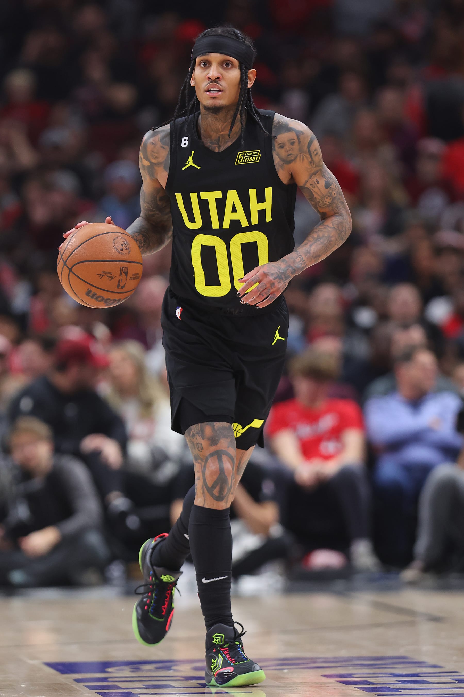 CHICAGO, ILLINOIS - JANUARY 07: Jordan Clarkson #00 of the Utah Jazz dribbles the ball up the court against the Chicago Bulls during the second half at United Center on January 07, 2023 in Chicago, Illinois. NOTE TO USER: User expressly acknowledges and agrees that, by downloading and or using this photograph, User is consenting to the terms and conditions of the Getty Images License Agreement. (Photo by Michael Reaves/Getty Images)