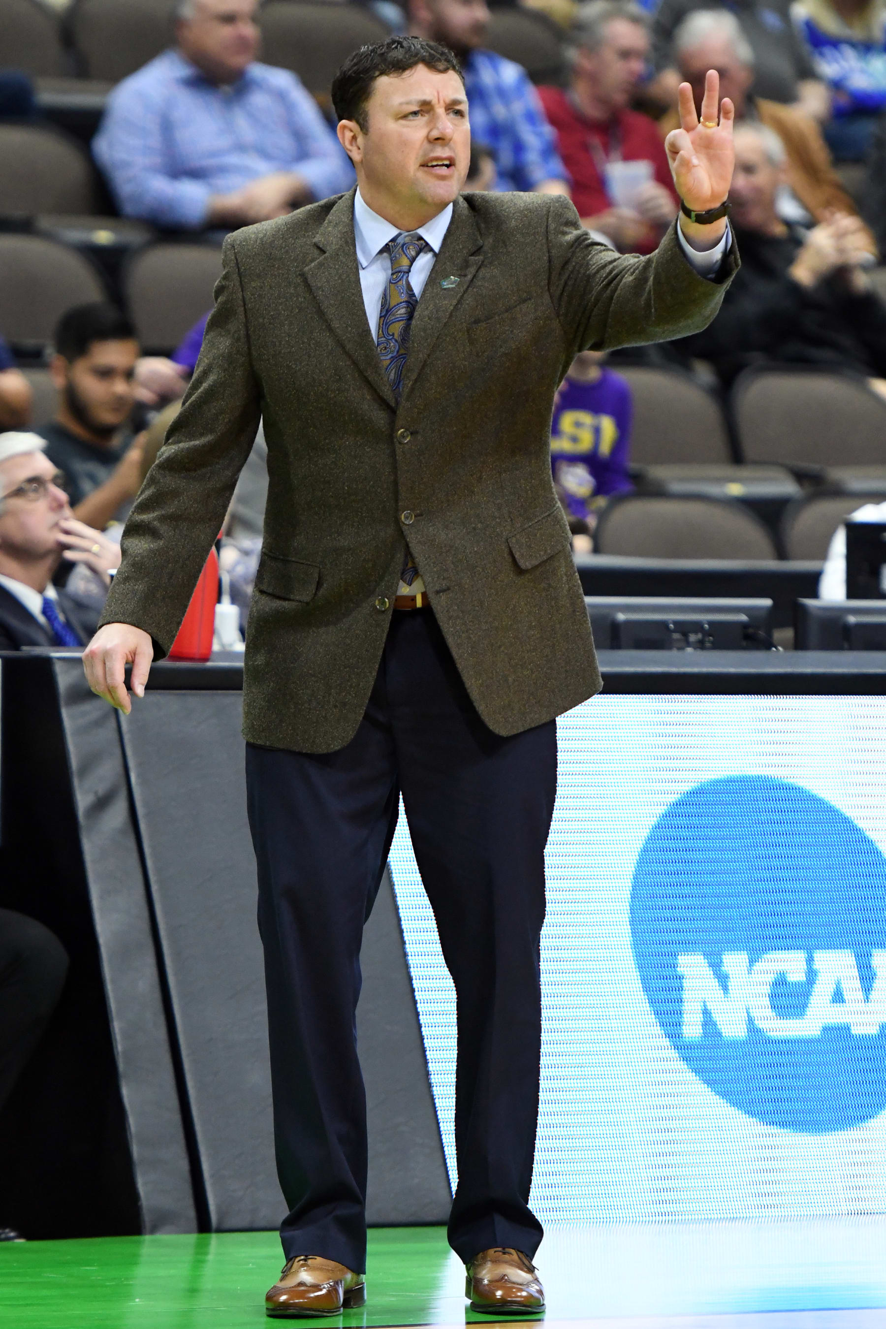 JACKSONVILLE, FL - MARCH 21:  Assistant coach Greg Heiar signals his players during the First Round of the NCAA Basketball Tournament against the Yale Bulldogs at the VyStar Veterans Memorial Arena on March 21, 2019 in Jacksonville, Florida.  (Photo by Mitchell Layton/Getty Images)