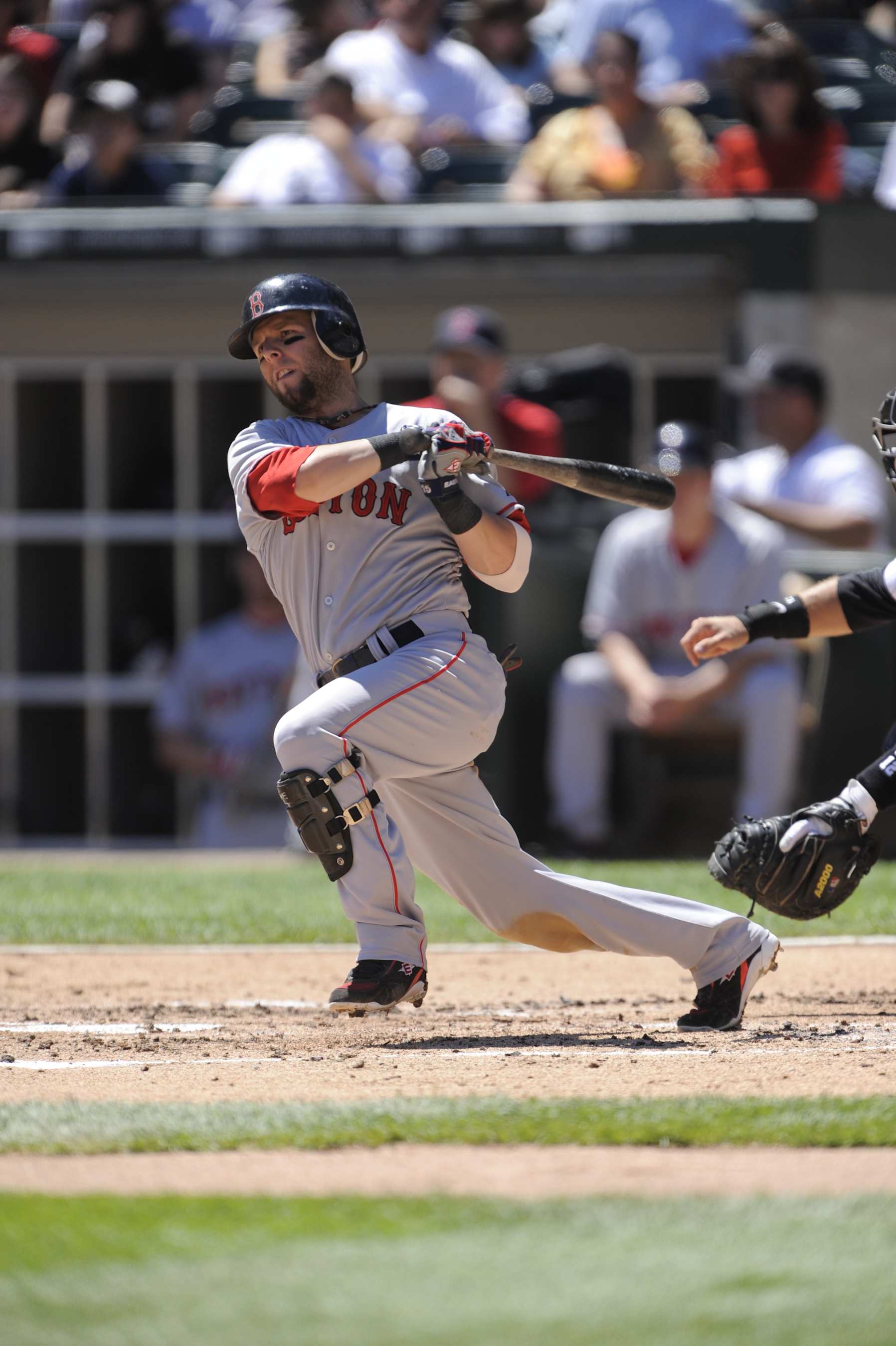 CHICAGO - AUGUST  10: Dustin Pedroia #15 of the Boston Red Sox hits during the game against the Chicago White Sox at U.S. Cellular Field in Chicago, Illinois on August 10, 2008.  The White Sox defeated the Red Sox 6-5.  (Photo by Ron Vesely/MLB via Getty Images) 