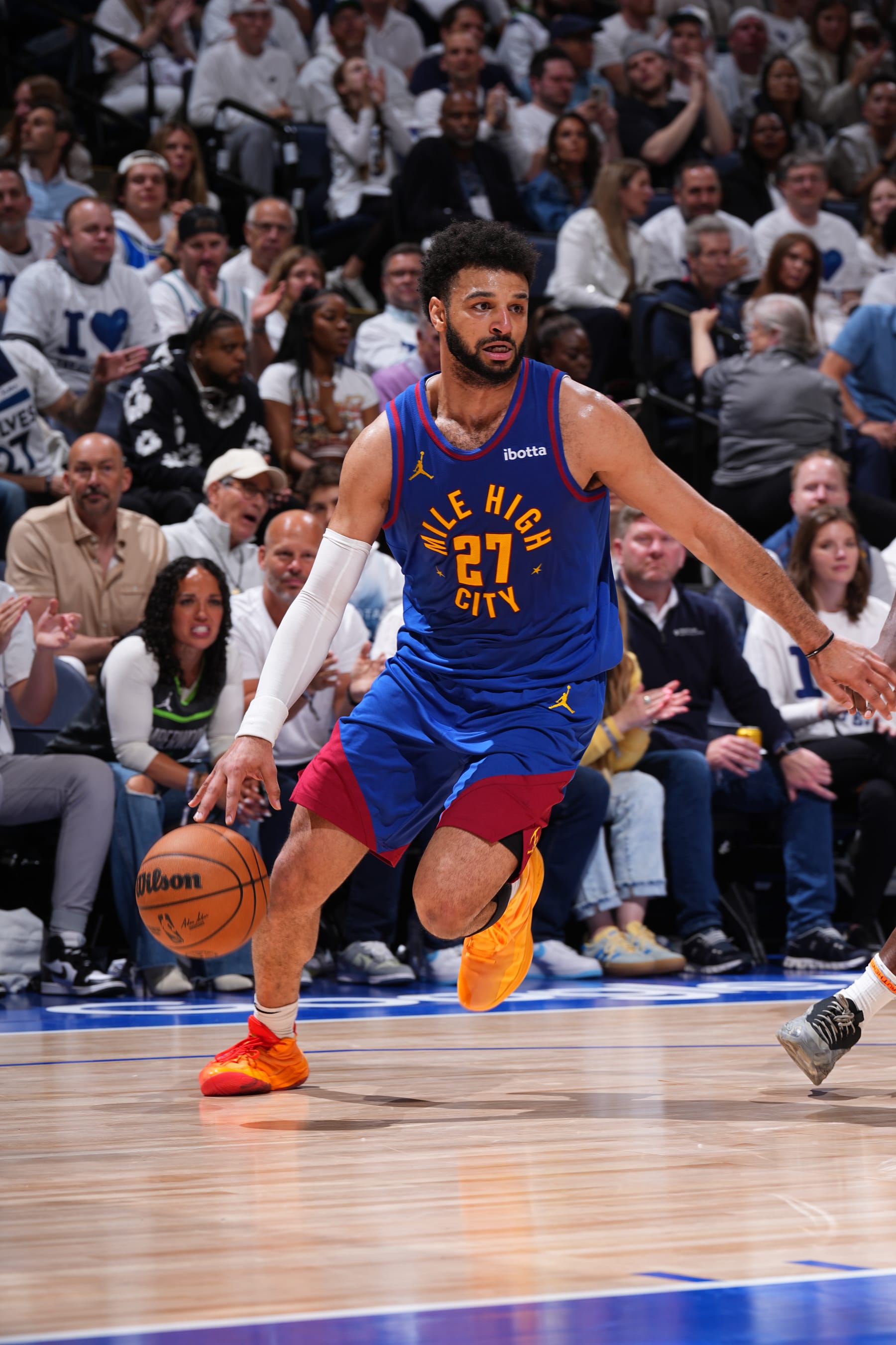 MINNEAPOLIS, MN - MAY 16: Jamal Murray #27 of the Denver Nuggets dribbles the ball during the game against the Minnesota Timberwolves during Round 2 Game 6 of the 2024 NBA Playoffs on May 16, 2024 at Target Center in Minneapolis, Minnesota. NOTE TO USER: User expressly acknowledges and agrees that, by downloading and or using this Photograph, user is consenting to the terms and conditions of the Getty Images License Agreement. Mandatory Copyright Notice: Copyright 2024 NBAE (Photo by Garrett Ellwood/NBAE via Getty Images)
