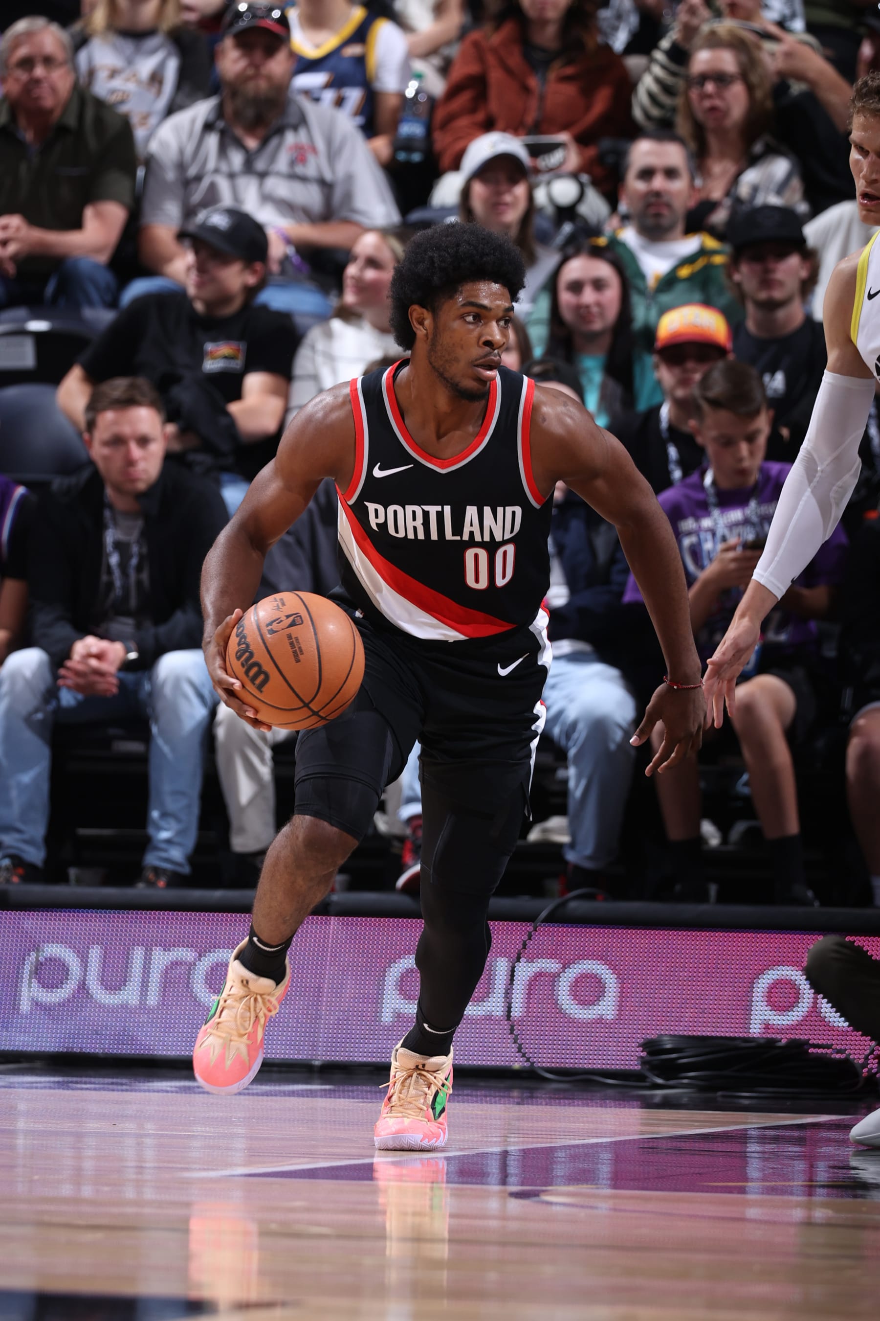 SALT LAKE CITY, UT - OCTOBER 14: Scoot Henderson #00 of the Portland Trail Blazers handles the ball during the preseason game on October 14, 2023 at vivint.SmartHome Arena in Salt Lake City, Utah. NOTE TO USER: User expressly acknowledges and agrees that, by downloading and or using this Photograph, User is consenting to the terms and conditions of the Getty Images License Agreement. Mandatory Copyright Notice: Copyright 2023 NBAE (Photo by Melissa Majchrzak/NBAE via Getty Images)
