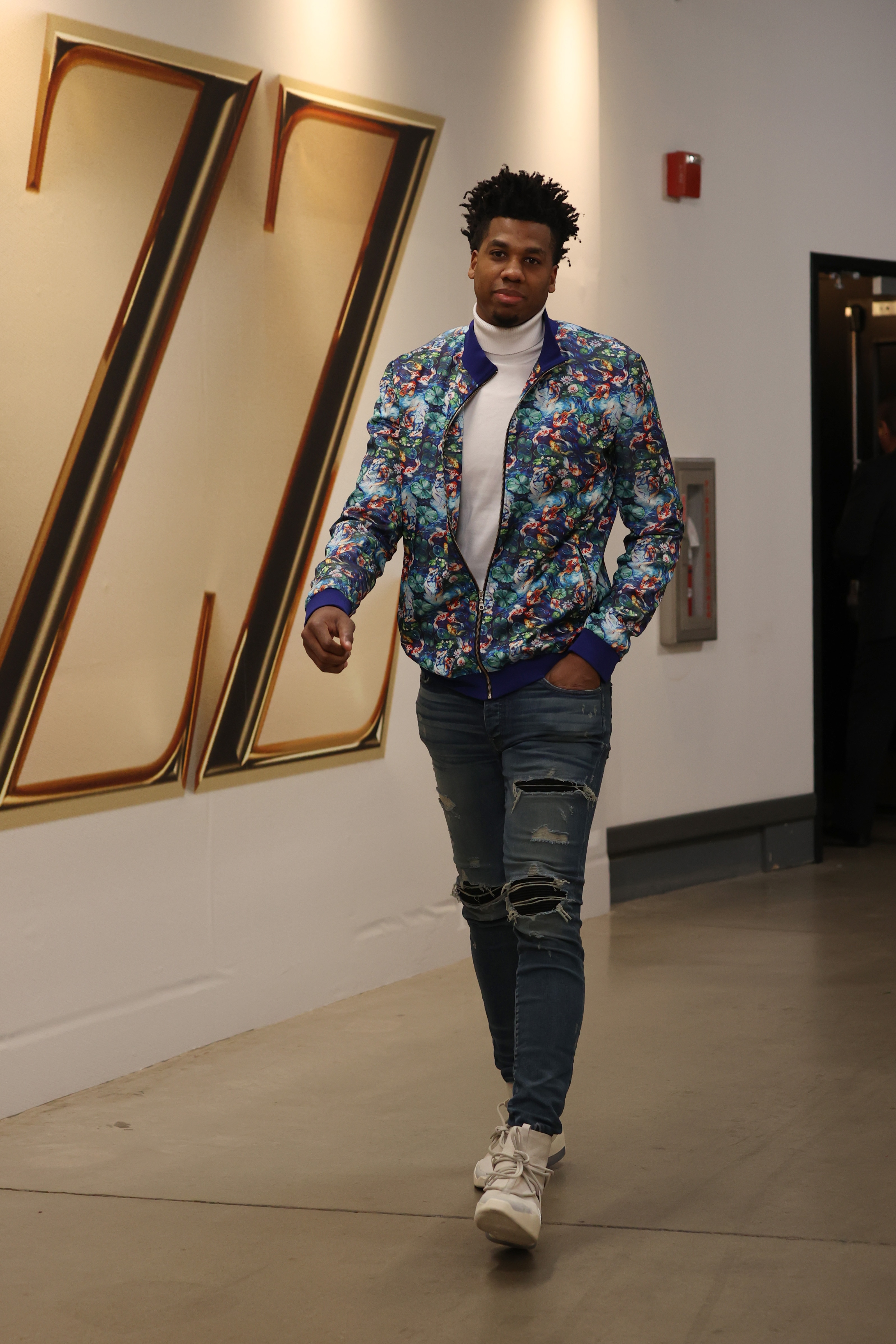 SALT LAKE CITY, UT - APRIL 21: Hassan Whiteside #21 of the Utah Jazz arrives to the arena prior to the game against the Dallas Mavericks during Round 1 Game 3 of the NBA Playoffs on April 21, 2022 at vivint.SmartHome Arena in Salt Lake City, Utah. NOTE TO USER: User expressly acknowledges and agrees that, by downloading and or using this Photograph, User is consenting to the terms and conditions of the Getty Images License Agreement. Mandatory Copyright Notice: Copyright 2022 NBAE (Photo by Melissa Majchrzak/NBAE via Getty Images)