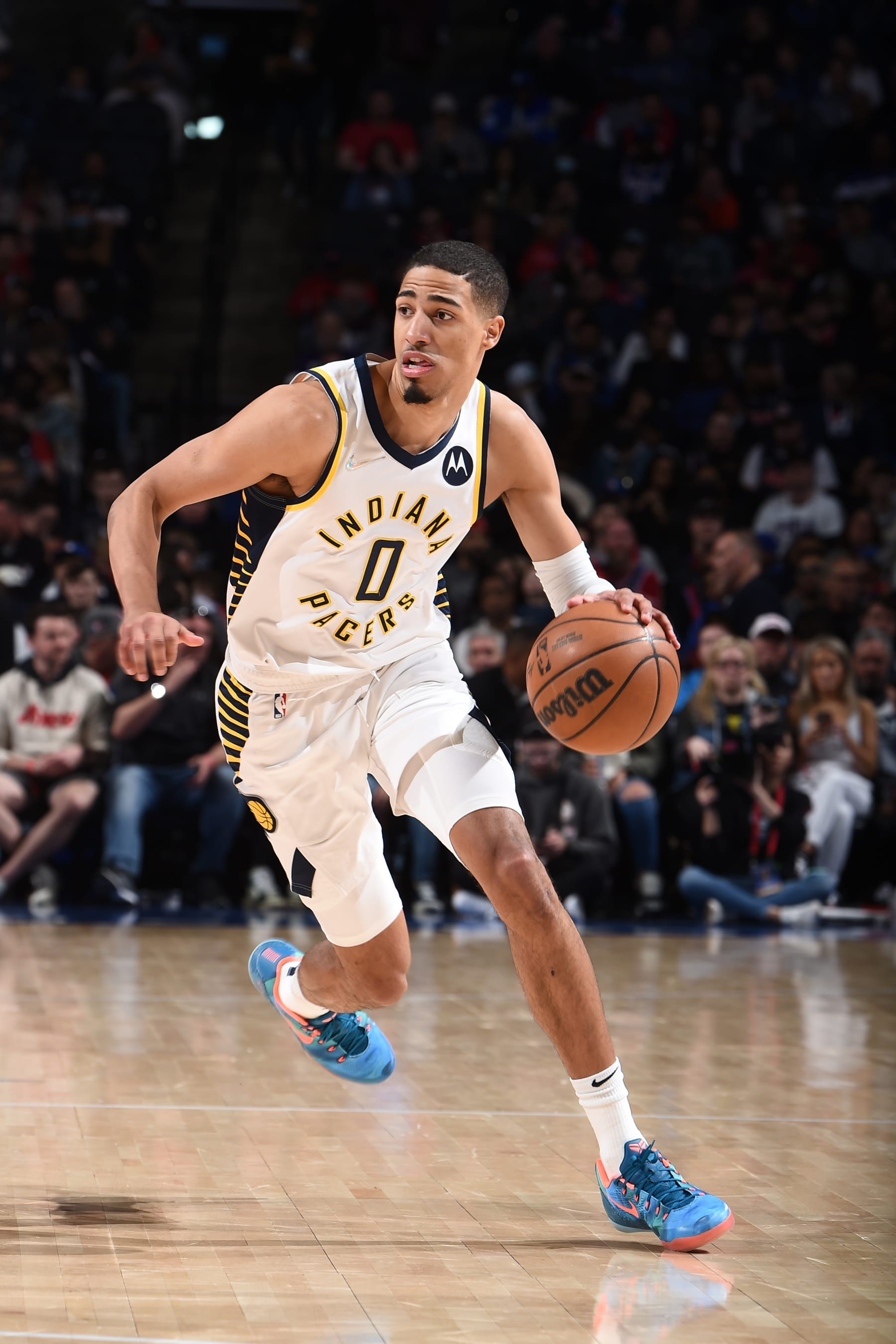 PHILADELPHIA, PA - APRIL 9: Tyrese Haliburton #0 of the Indiana Pacers drives to the basket during the game against the Philadelphia 76ers on April 9, 2022 at the Wells Fargo Center in Philadelphia, Pennsylvania NOTE TO USER: User expressly acknowledges and agrees that, by downloading and/or using this Photograph, user is consenting to the terms and conditions of the Getty Images License Agreement. Mandatory Copyright Notice: Copyright 2022 NBAE (Photo by David Dow/NBAE via Getty Images)