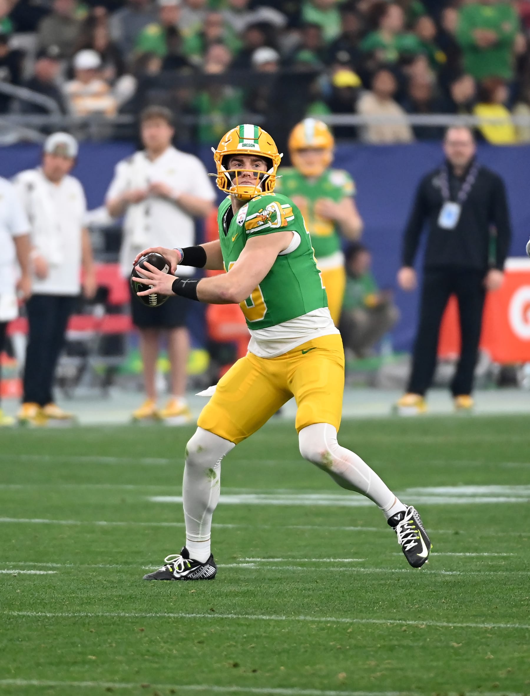 GLENDALE, ARIZONA - JANUARY 01: Bo Nix #10 of the Oregon Ducks throws the ball against the Liberty Flames during the 2023 Vrbo Fiesta Bowl game at State Farm Stadium on January 01, 2024 in Glendale, Arizona. (Photo by Norm Hall/Getty Images)