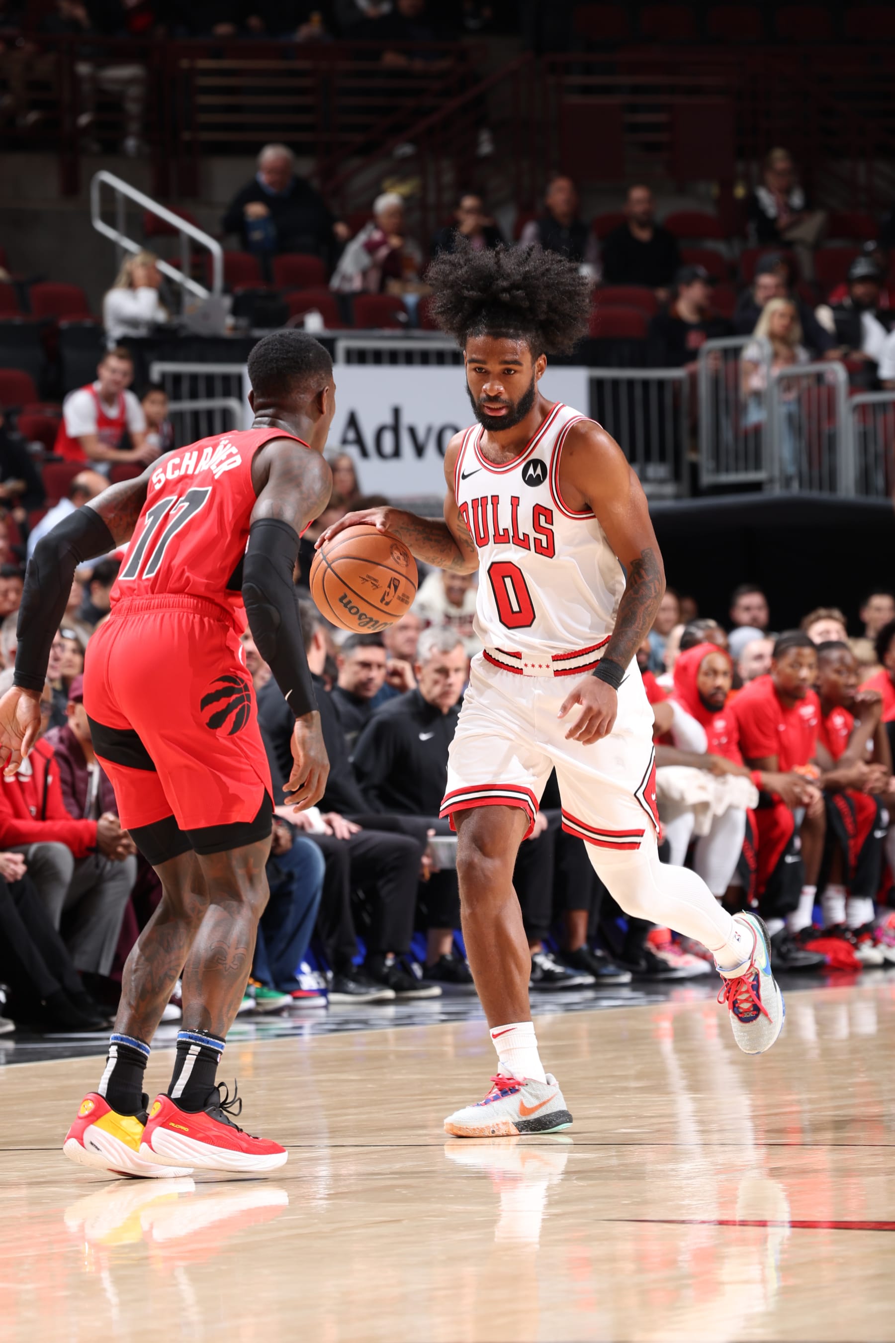 CHICAGO, IL - OCTOBER 17: Coby White #0 of the Chicago Bulls brings the ball up court against the Toronto Raptors  on October 17, 2023 at United Center in Chicago, Illinois. NOTE TO USER: User expressly acknowledges and agrees that, by downloading and or using this photograph, User is consenting to the terms and conditions of the Getty Images License Agreement. Mandatory Copyright Notice: Copyright 2023 NBAE (Photo by Jeff Haynes/NBAE via Getty Images)