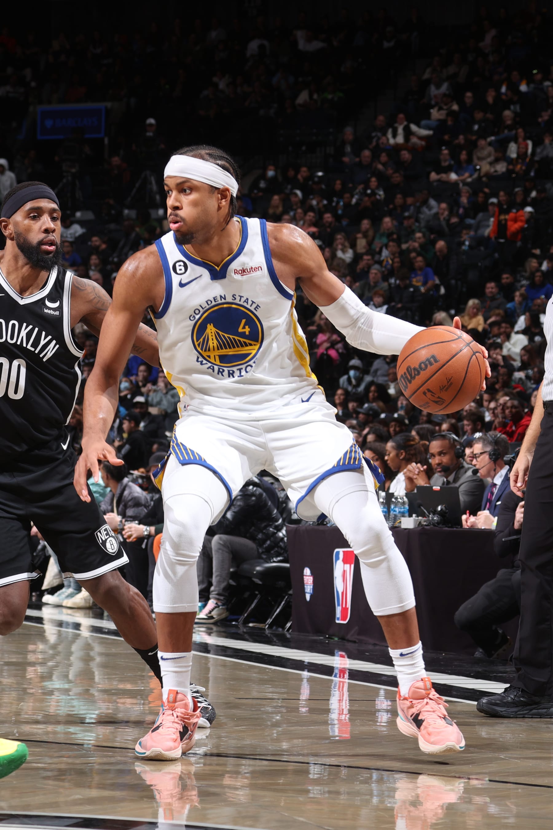 BROOKLYN, NY - DECEMBER 21: Moses Moody #4 of the Golden State Warriors dribbles the ball during the game against the Brooklyn Nets on December 21, 2022 at Barclays Center in Brooklyn, New York. NOTE TO USER: User expressly acknowledges and agrees that, by downloading and or using this Photograph, user is consenting to the terms and conditions of the Getty Images License Agreement. Mandatory Copyright Notice: Copyright 2022 NBAE (Photo by Nathaniel S. Butler/NBAE via Getty Images)