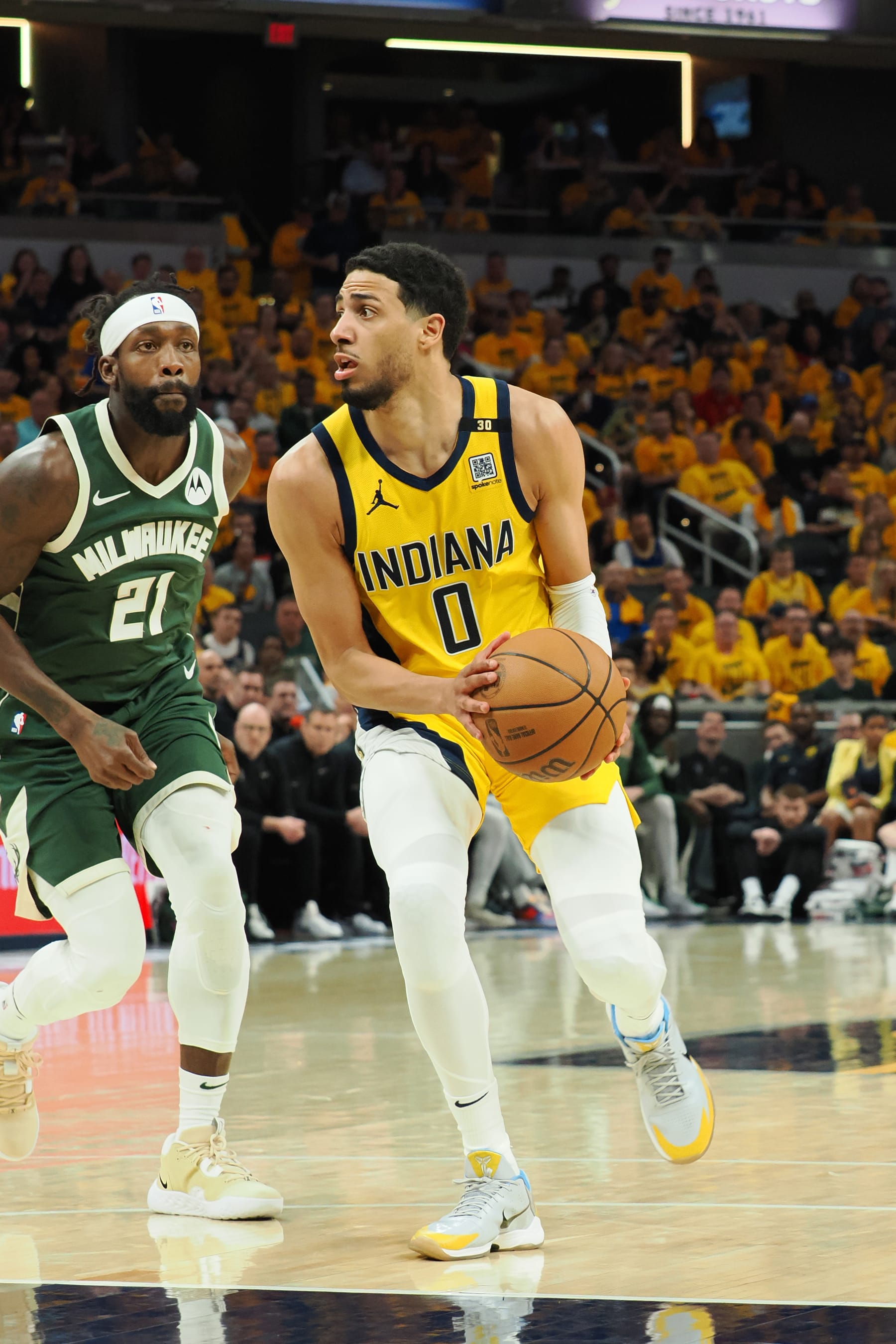 INDIANAPOLIS, IN - MAY 2:  Tyrese Haliburton #0 of the Indiana Pacers handles the ball during the game against the Milwaukee Bucks during Round 1 Game 6 of the 2024 NBA Playoffs on May 2, 2024 at Gainbridge Fieldhouse in Indianapolis, Indiana. NOTE TO USER: User expressly acknowledges and agrees that, by downloading and or using this Photograph, user is consenting to the terms and conditions of the Getty Images License Agreement. Mandatory Copyright Notice: Copyright 2024 NBAE (Photo by Ron Hoskins/NBAE via Getty Images)
