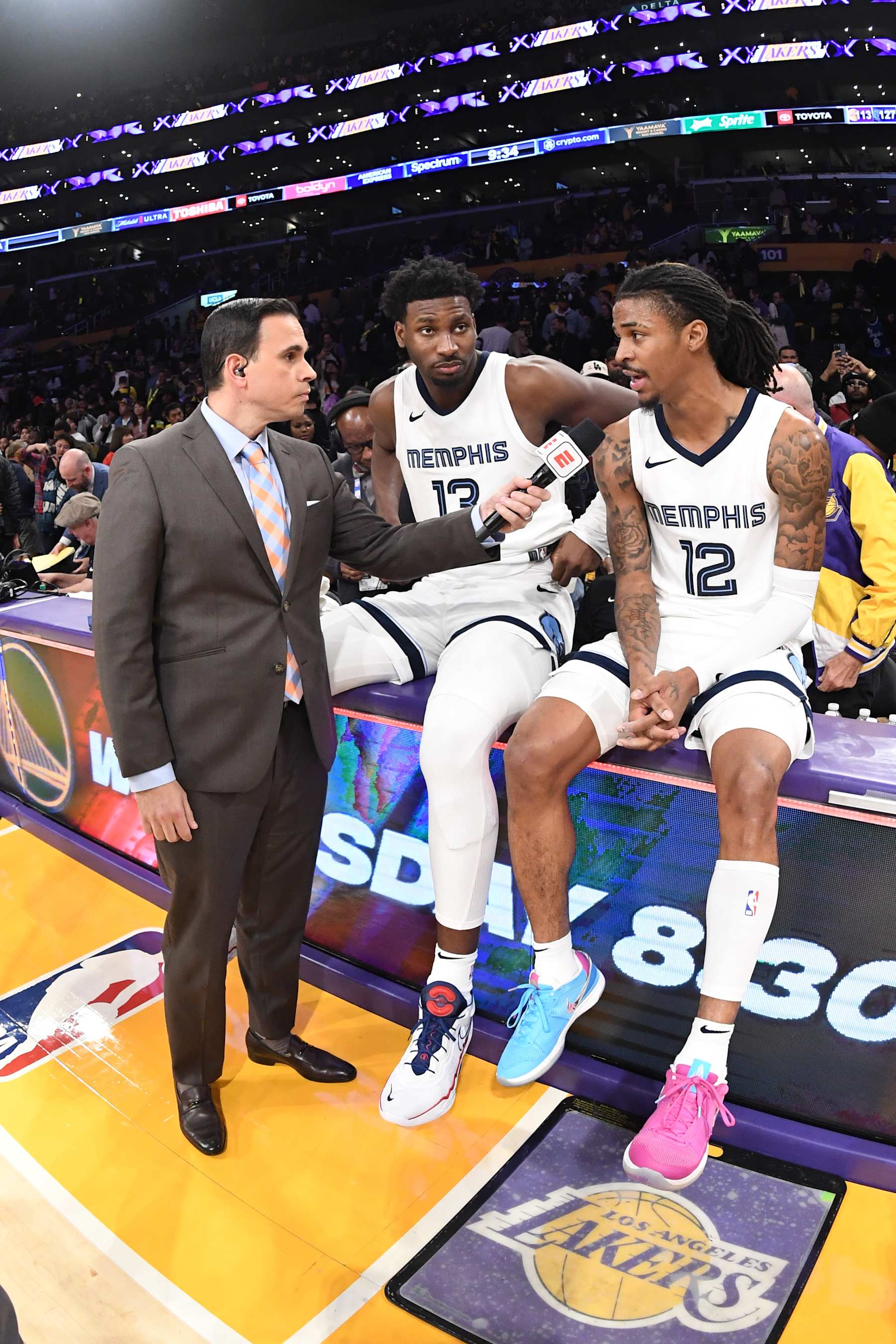 LOS ANGELES, CA - JANUARY 5:  Ja Morant #12 of the Memphis Grizzlies & Jaren Jackson Jr. #13 of the Memphis Grizzlies talks to the media after the game  on January 5, 2024 at Crypto.Com Arena in Los Angeles, California. NOTE TO USER: User expressly acknowledges and agrees that, by downloading and/or using this Photograph, user is consenting to the terms and conditions of the Getty Images License Agreement. Mandatory Copyright Notice: Copyright 2024 NBAE (Photo by Andrew D. Bernstein/NBAE via Getty Images)