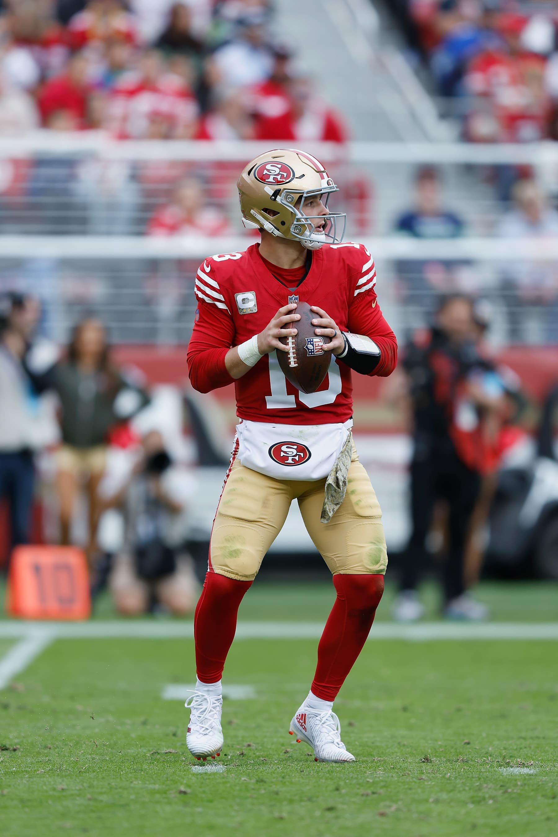 SANTA CLARA, CALIFORNIA - NOVEMBER 17: Brock Purdy #13 of the San Francisco 49ers looks to pass the ball in the second quarter against the Seattle Seahawks at Levi's Stadium on November 17, 2024 in Santa Clara, California. (Photo by Lachlan Cunningham/Getty Images)