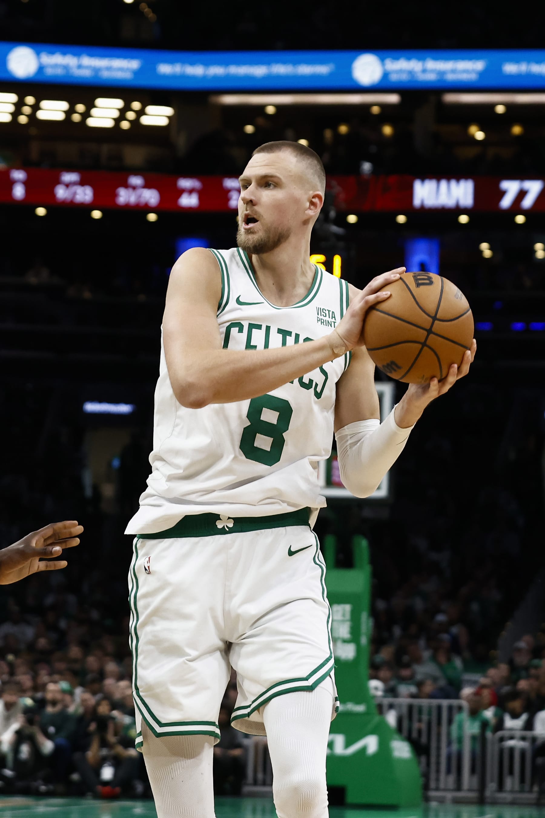 BOSTON, MA - APRIL 21: Kristaps Porzingis #8 of the Boston Celtics against the Miami Heat during the second half of game one of the Eastern Conference First Round Playoffs at TD Garden on April 21, 2024 in Boston, Massachusetts. NOTE TO USER: User expressly acknowledges and agrees that, by downloading and/or using this Photograph, user is consenting to the terms and conditions of the Getty Images License Agreement. (Photo By Winslow Townson/Getty Images)