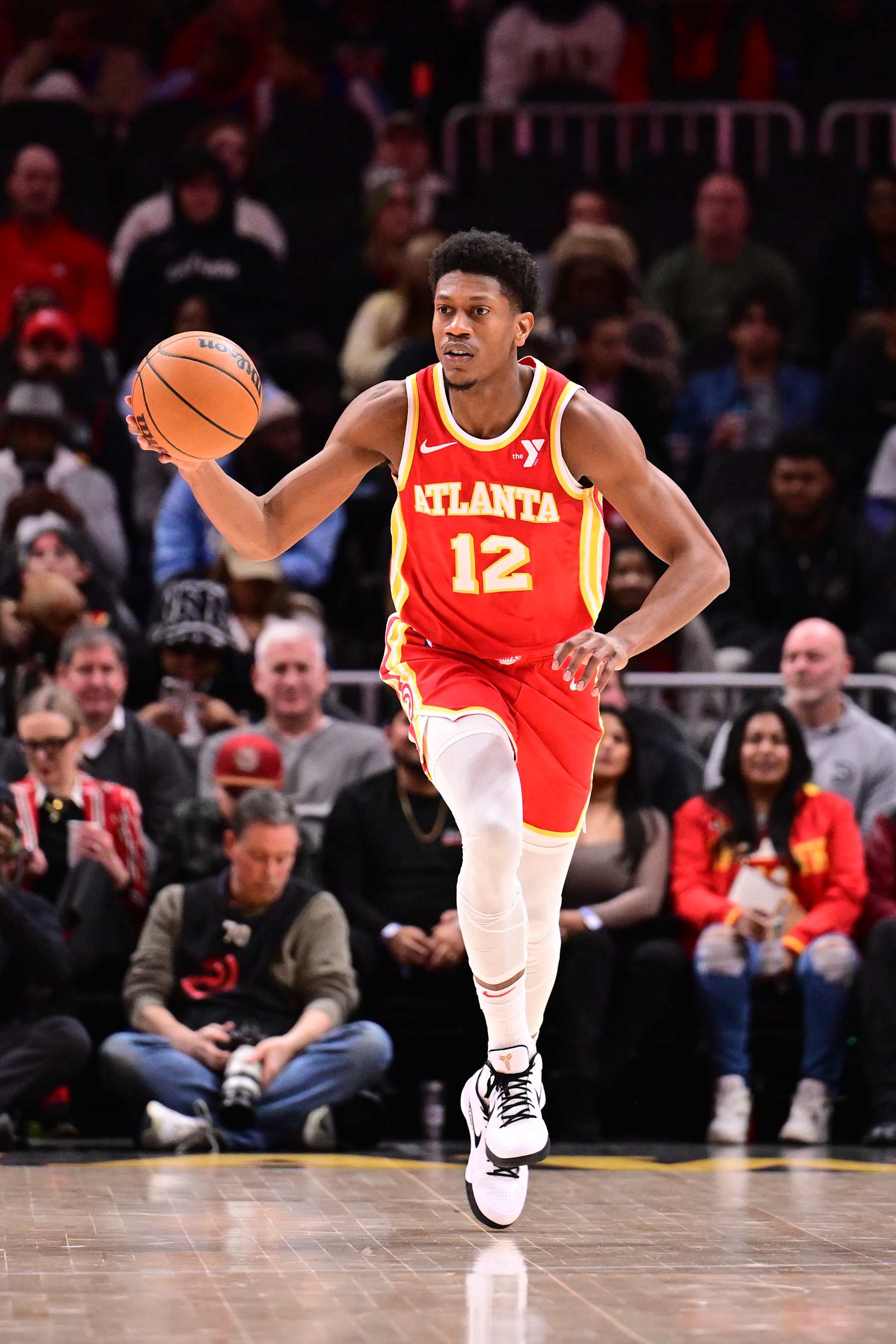 ATLANTA, GA - JANUARY 22: De'Andre Hunter #12 of the Atlanta Hawks dribbles the ball during the game against the Detroit Pistons on January 22, 2025 at State Farm Arena in Atlanta, Georgia.  NOTE TO USER: User expressly acknowledges and agrees that, by downloading and/or using this Photograph, user is consenting to the terms and conditions of the Getty Images License Agreement. Mandatory Copyright Notice: Copyright 2025 NBAE (Photo by Adam Hagy/NBAE via Getty Images)