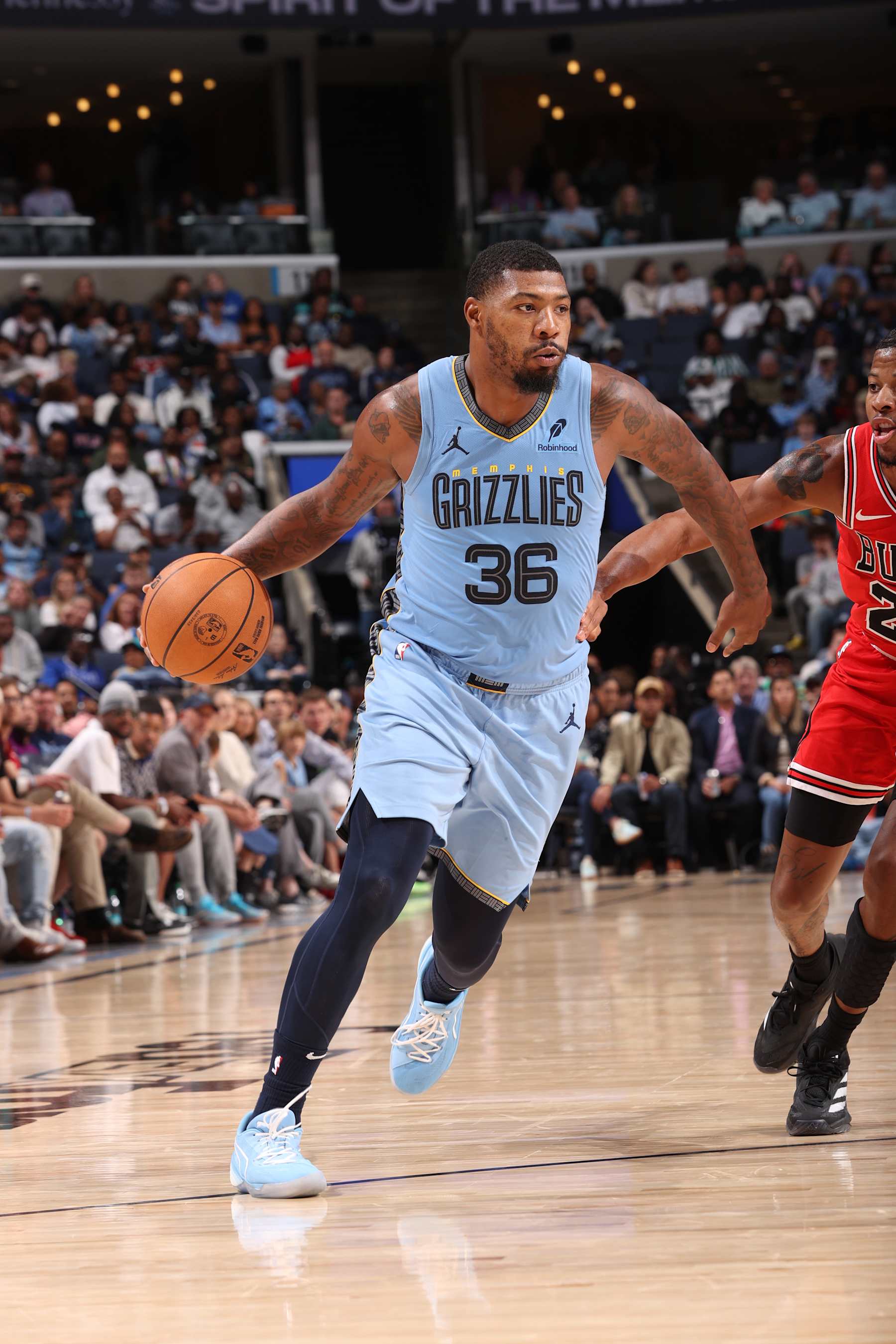 MEMPHIS, TN - OCTOBER 28: Marcus Smart #36 of the Memphis Grizzlies drives to the basket during the game against the Chicago Bulls on October 28, 2024 at FedExForum in Memphis, Tennessee. NOTE TO USER: User expressly acknowledges and agrees that, by downloading and or using this photograph, User is consenting to the terms and conditions of the Getty Images License Agreement. Mandatory Copyright Notice: Copyright 2024 NBAE (Photo by Joe Murphy/NBAE via Getty Images)