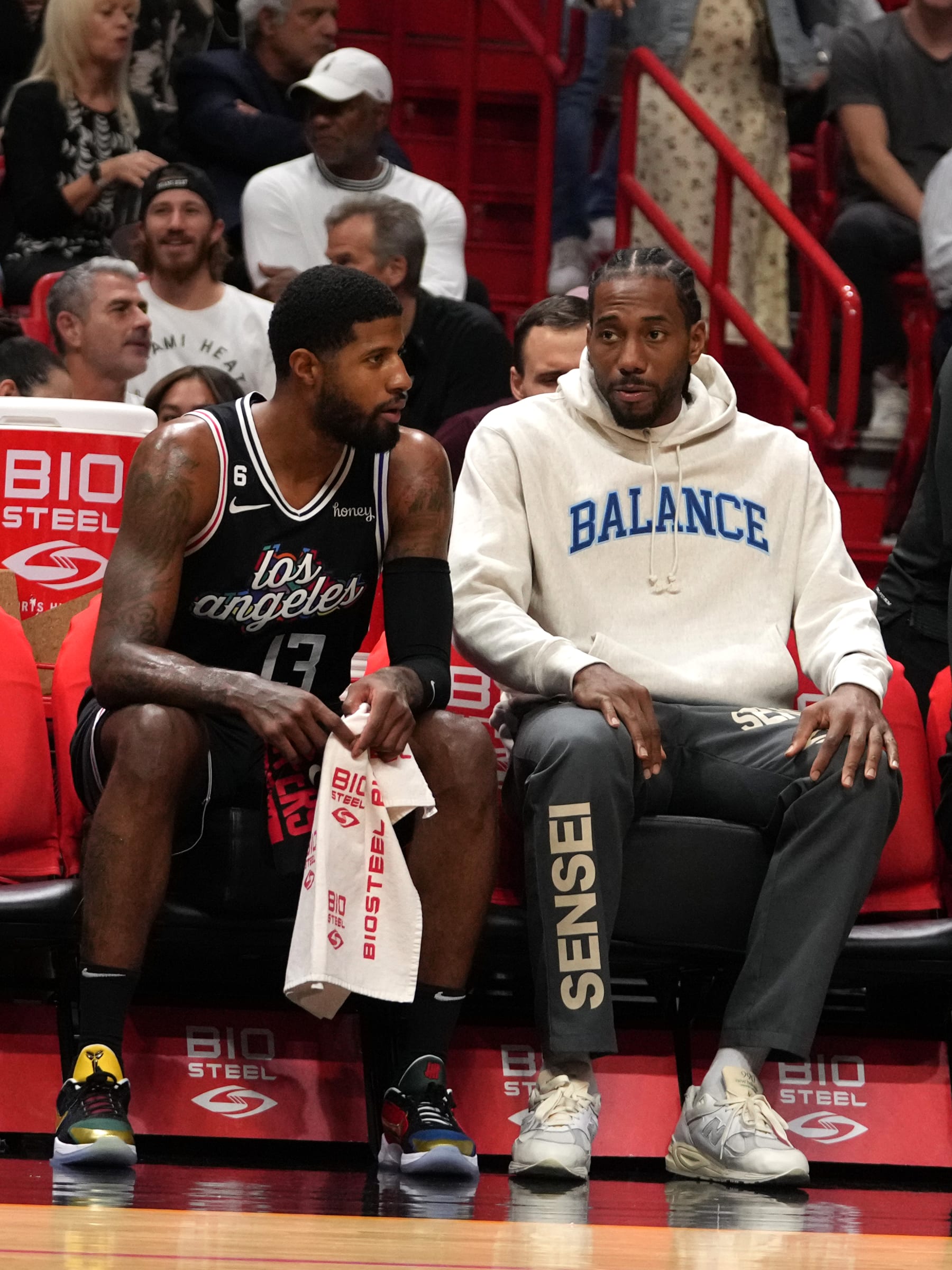 MIAMI, FL - DECEMBER 8: Paul George #13 and Kawhi Leonard #2 of the LA Clippers on the bench during the game against the Miami Heat and on December 8, 2022 at FTX Arena in Miami, Florida. NOTE TO USER: User expressly acknowledges and agrees that, by downloading and or using this Photograph, user is consenting to the terms and conditions of the Getty Images License Agreement. Mandatory Copyright Notice: Copyright 2022 NBAE (Photo by IEric Espada/NBAE via Getty Images)