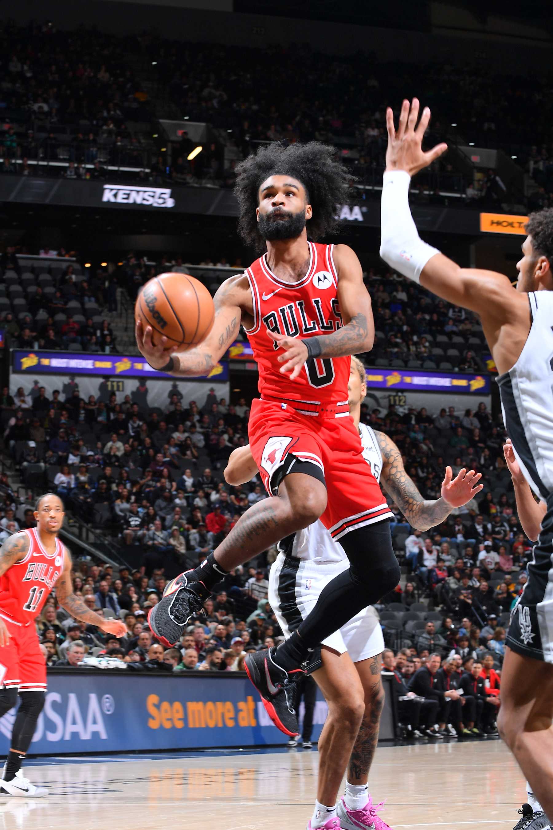 SAN ANTONIO, TX - JANUARY 13: Coby White #0 of the Chicago Bulls drives to the basket during the game against the San Antonio Spurs on January 13, 2024 at the Frost Bank Center in San Antonio, Texas. NOTE TO USER: User expressly acknowledges and agrees that, by downloading and or using this photograph, user is consenting to the terms and conditions of the Getty Images License Agreement. Mandatory Copyright Notice: Copyright 2024 NBAE (Photos by Michael Gonzales/NBAE via Getty Images)