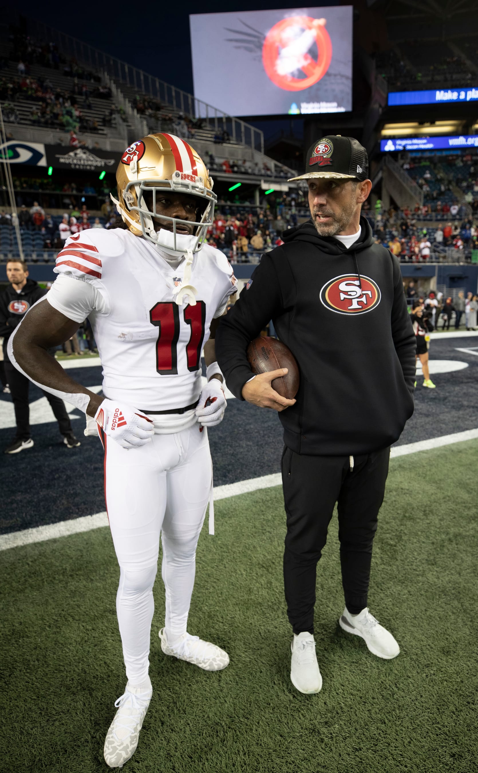 SEATTLE, WA - DECEMBER 15: Brandon Aiyuk #11 and Head Coach Kyle Shanahan of the San Francisco 49ers on the field before the game against the Seattle Seahawks at Lumen Field on December 15, 2022 in Seattle, Washington. The 49ers defeated the Seahawks 21-13. (Photo by Michael Zagaris/San Francisco 49ers/Getty Images)