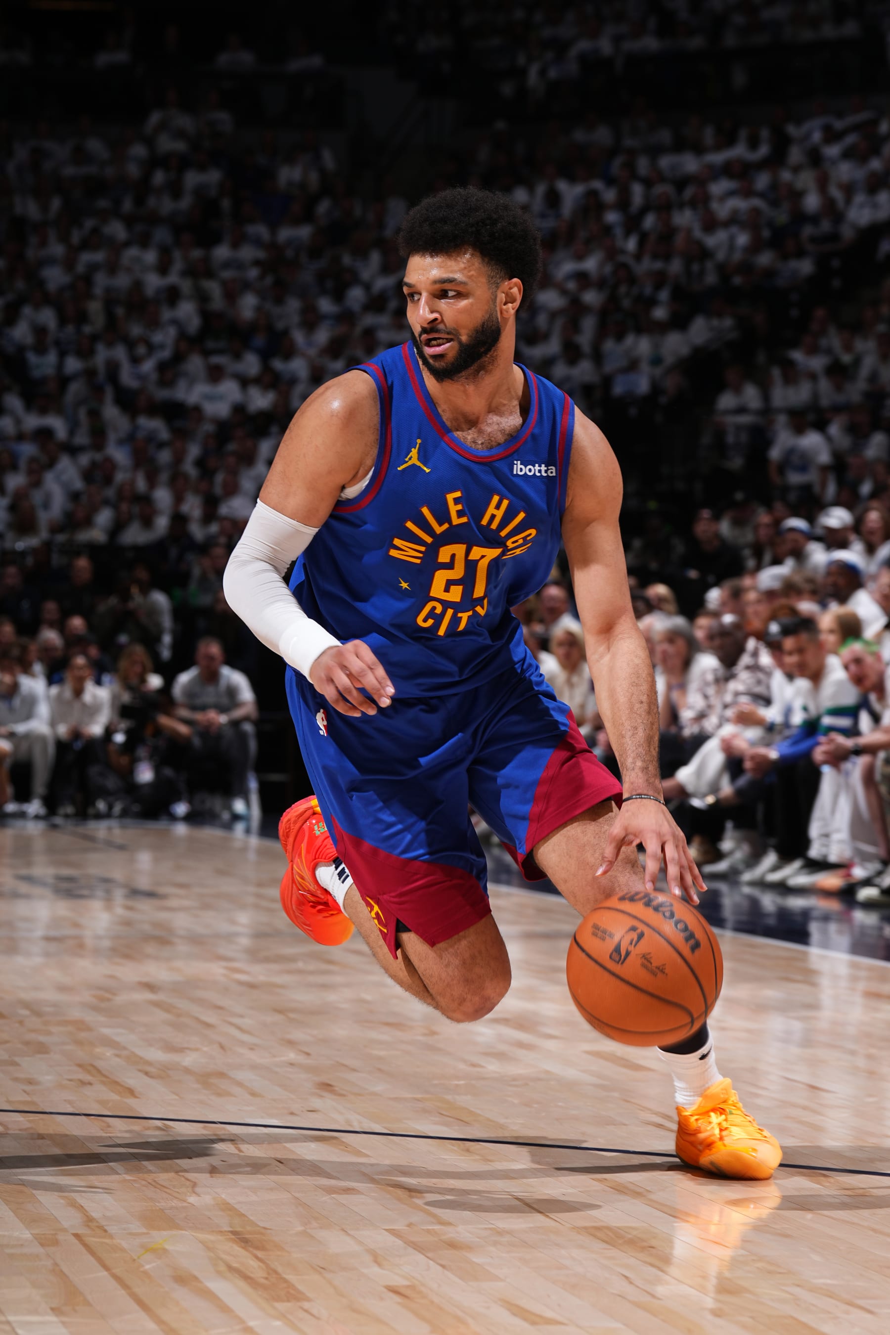 MINNEAPOLIS, MN - MAY 10: Jamal Murray #27 of the Denver Nuggets dribbles the ball during the game against the Minnesota Timberwolves during Round 2 Game 3 of the 2024 NBA Playoffs on May 10, 2024 at Target Center in Minneapolis, Minnesota. NOTE TO USER: User expressly acknowledges and agrees that, by downloading and or using this Photograph, user is consenting to the terms and conditions of the Getty Images License Agreement. Mandatory Copyright Notice: Copyright 2024 NBAE (Photo by Garrett Ellwood/NBAE via Getty Images)