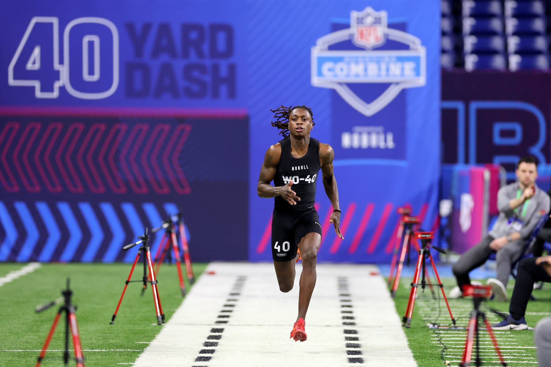 INDIANAPOLIS, INDIANA - MARCH 02: Xavier Worthy #WO40 of Texas participates in the 40-yard dash during the NFL Combine at Lucas Oil Stadium on March 02, 2024 in Indianapolis, Indiana. (Photo by Stacy Revere/Getty Images)