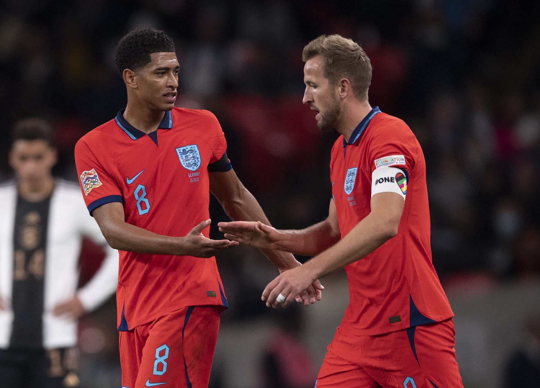 LONDON, ENGLAND - SEPTEMBER 26:  Jude Bellingham and Harry Kane of England shake hands during the UEFA Nations League League A Group 3 match between England and Germany at Wembley Stadium on September 26, 2022 in London, England. (Photo by Visionhaus/Getty Images)