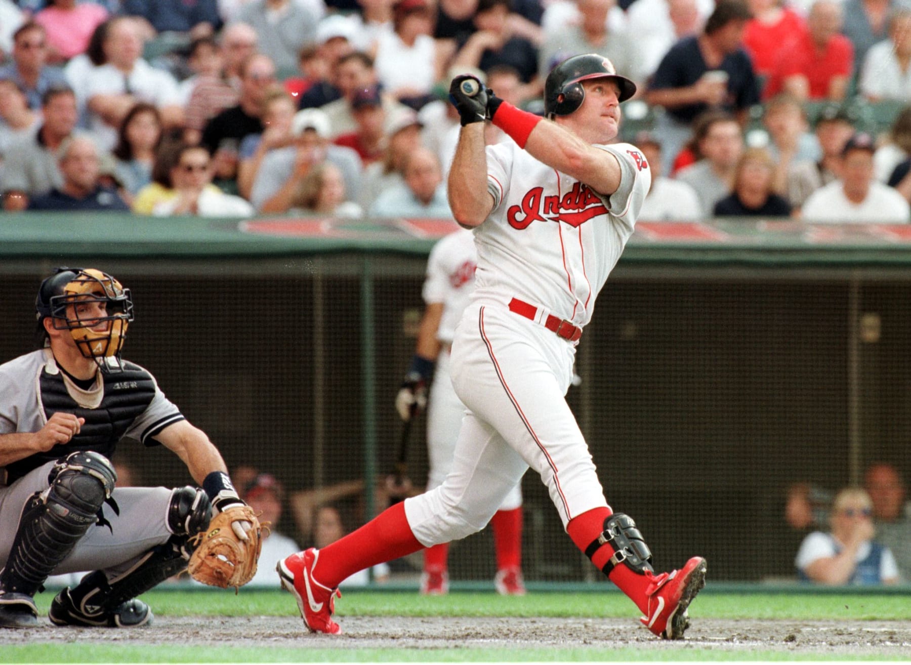 Cleveland Indians batter Jim Thome watches as his solo home run goes over the right field wall during the second inning against the New York Yankees 19 June at Jacobs Field in Cleveland, OH.  Thome had two home runs as the Indians defeated the Yankees 7-4 . 
AFP PHOTO/Anthony ONCHAK (Photo by ANTHONY ONCHAK / AFP)        (Photo credit should read ANTHONY ONCHAK/AFP via Getty Images)