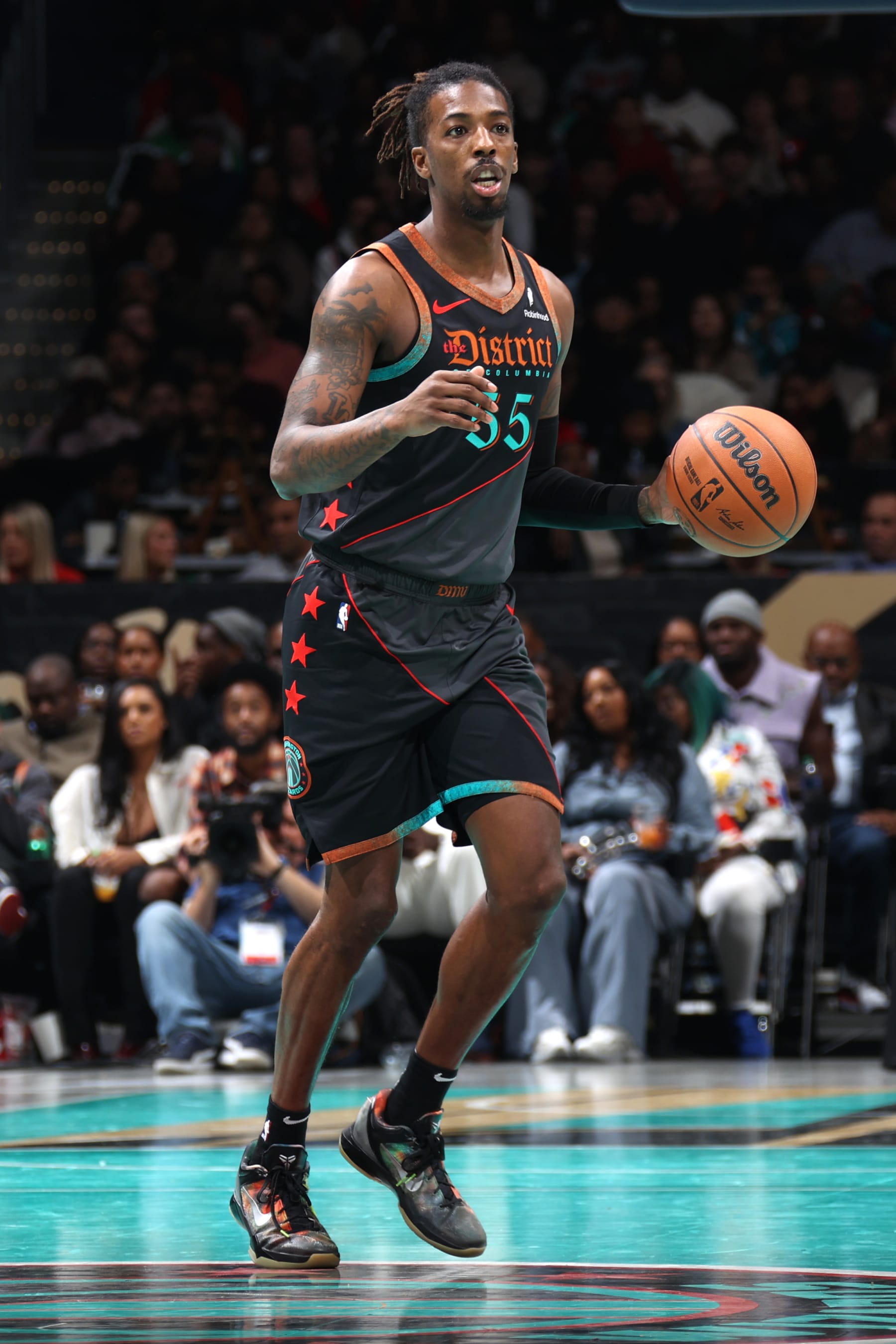 WASHINGTON, DC -  NOVEMBER 10: Delon Wright #55 of the Washington Wizards dribbles the ball during the game against the Charlotte Hornets during the In-Season Tournament on November 10, 2023 at Capital One Arena in Washington, DC. NOTE TO USER: User expressly acknowledges and agrees that, by downloading and or using this Photograph, user is consenting to the terms and conditions of the Getty Images License Agreement. Mandatory Copyright Notice: Copyright 2023 NBAE (Photo by Stephen Gosling/NBAE via Getty Images)