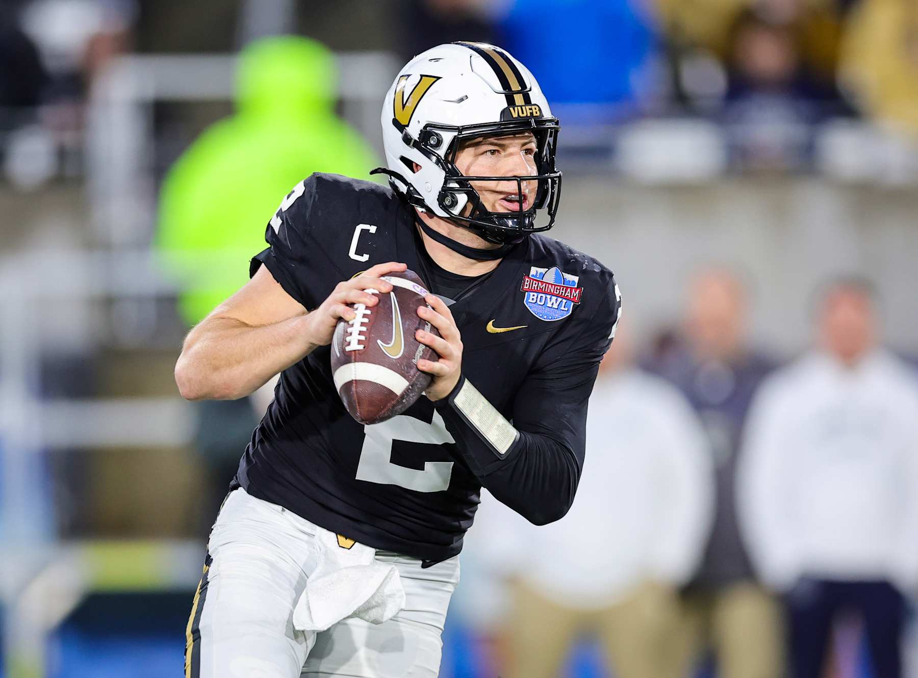 BIRMINGHAM, ALABAMA - DECEMBER 27: Diego Pavia #2 of the Vanderbilt Commodores rolls out to pass during the second half against the Georgia Tech Yellow Jackets in the Birmingham Bowl at Protective Stadium on December 27, 2024 in Birmingham, Alabama. (Photo by Brandon Sumrall/Getty Images)