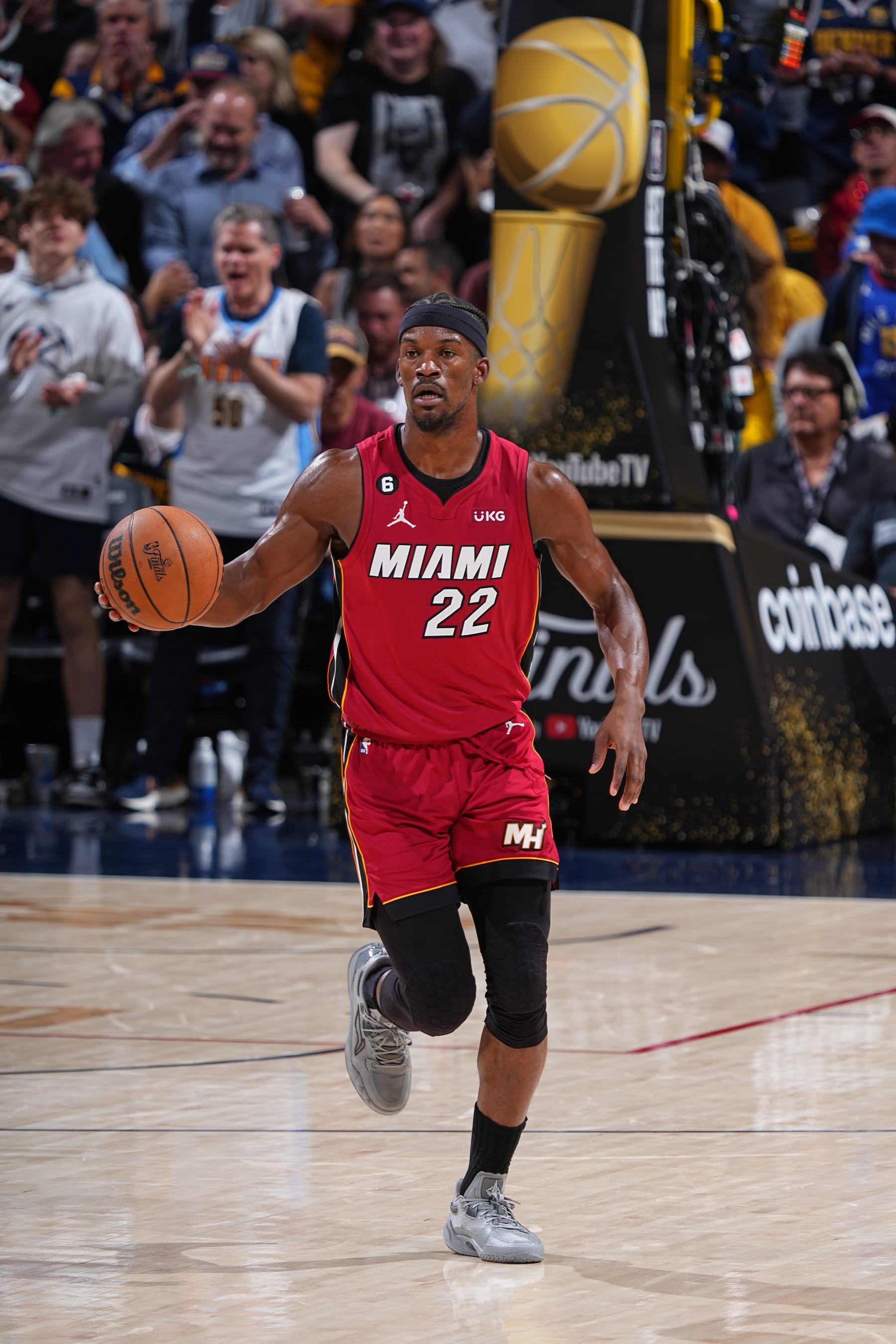 DENVER, CO - JUNE 12: Jimmy Butler #22 of the Miami Heat dribbles the ball against the Denver Nuggets during Game Five of the 2023 NBA Finals on June 12, 2023 at Ball Arena in Denver, Colorado. NOTE TO USER: User expressly acknowledges and agrees that, by downloading and or using this Photograph, user is consenting to the terms and conditions of the Getty Images License Agreement. Mandatory Copyright Notice: Copyright 2023 NBAE (Photo by Garrett Ellwood/NBAE via Getty Images)