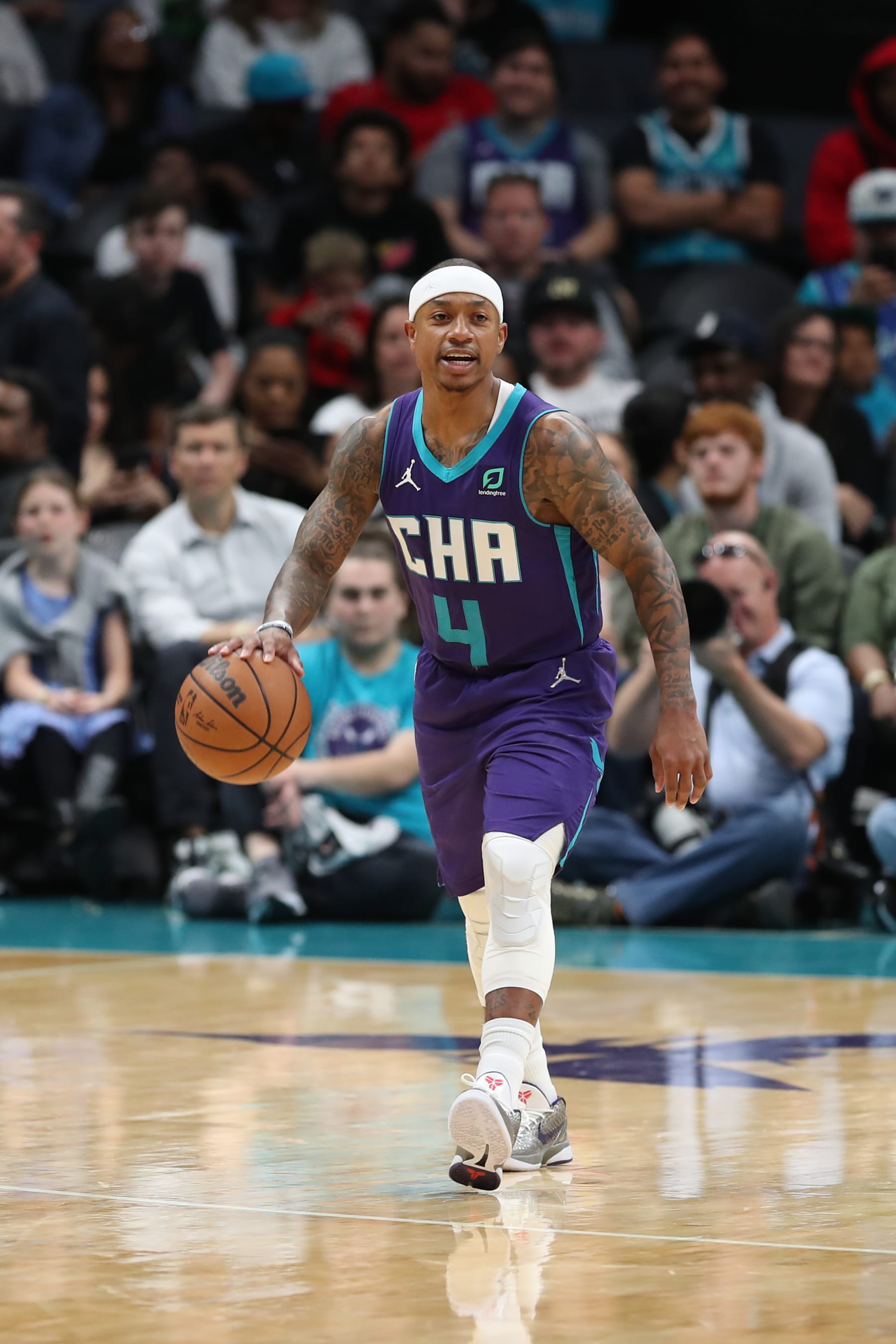 CHARLOTTE, NC - APRIL 10: Isaiah Thomas #4 of the Charlotte Hornets handles the ball during the game against the Washington Wizards on April 10, 2022 at Spectrum Center in Charlotte, North Carolina. NOTE TO USER: User expressly acknowledges and agrees that, by downloading and or using this photograph, User is consenting to the terms and conditions of the Getty Images License Agreement. Mandatory Copyright Notice: Copyright 2022 NBAE (Photo by Kent Smith/NBAE via Getty Images)