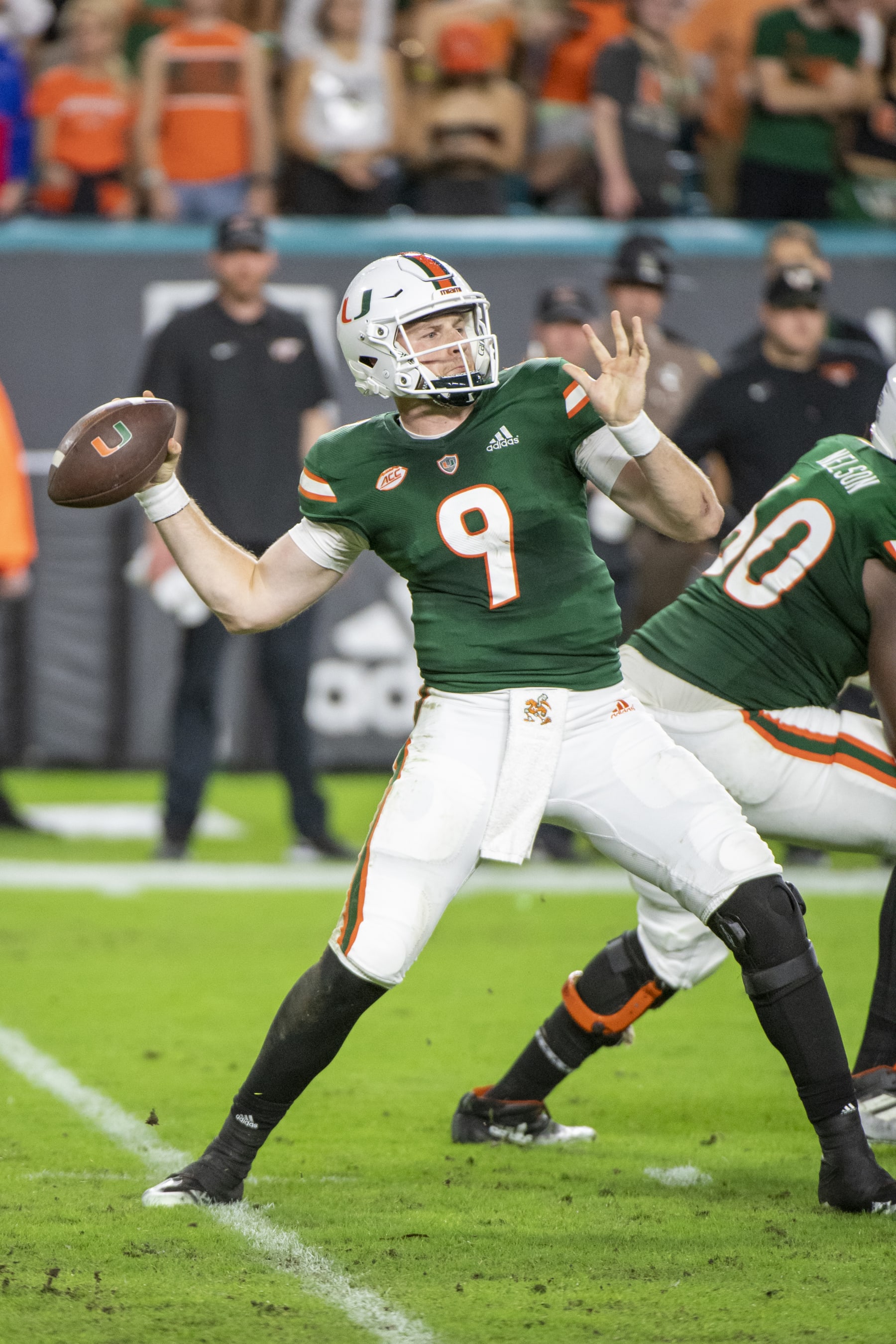 MIAMI GARDENS, FL - NOVEMBER 20: Miami quarterback Tyler Van Dyke (9) throws the ball during a college football game against the Virginia Tech Hokies on November 20, 2021 at the Hard Rock Stadium in Miami Gardens, FL. (Photo by Doug Murray/Icon Sportswire via Getty Images)
