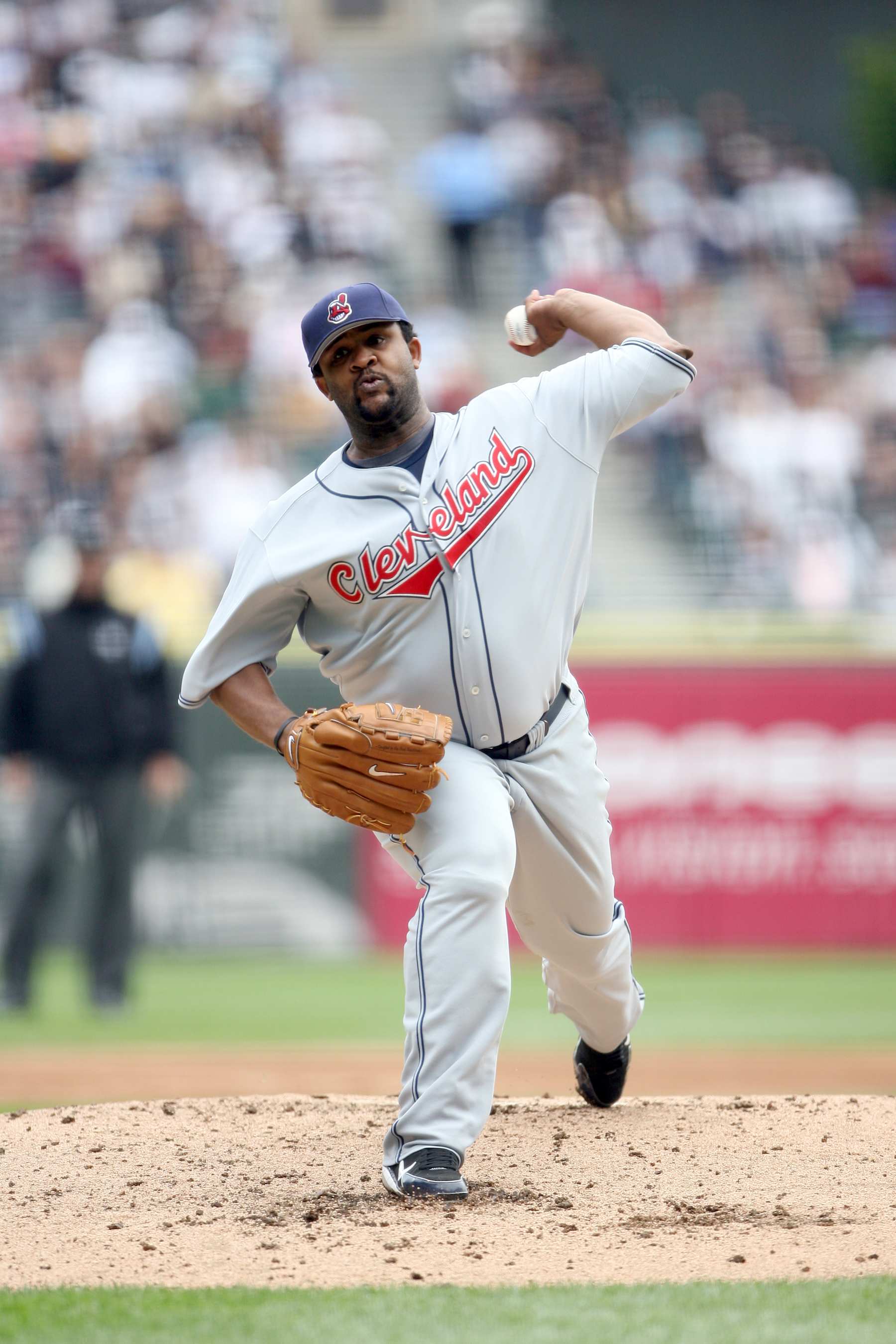 CHICAGO - JUNE 10:  C.C. Sabathia #52 of the Cleveland Indians delivers a pitch during the game against the Chicago White Sox at U.S. Cellular Field in Chicago, Illinois on June 10, 2006.  The White Sox defeated the Indians 4-3.  (Photo by Ron Vesely/MLB Photos via Getty Images) 