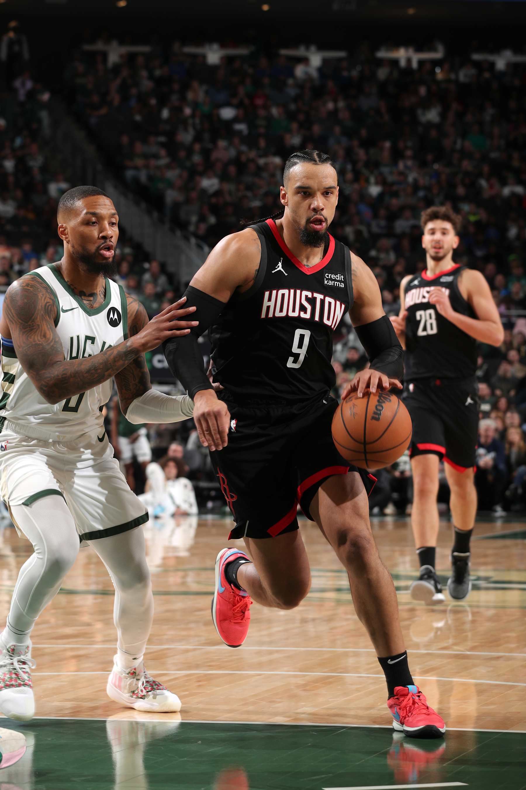 MILWAUKEE, WI - DECEMBER 17: Dillon Brooks #9 of the Houston Rockets dribbles the ball during the game against the Milwaukee Bucks on December 17, 2023 at the Fiserv Forum Center in Milwaukee, Wisconsin. NOTE TO USER: User expressly acknowledges and agrees that, by downloading and or using this Photograph, user is consenting to the terms and conditions of the Getty Images License Agreement. Mandatory Copyright Notice: Copyright 2023 NBAE (Photo by Gary Dineen/NBAE via Getty Images).
