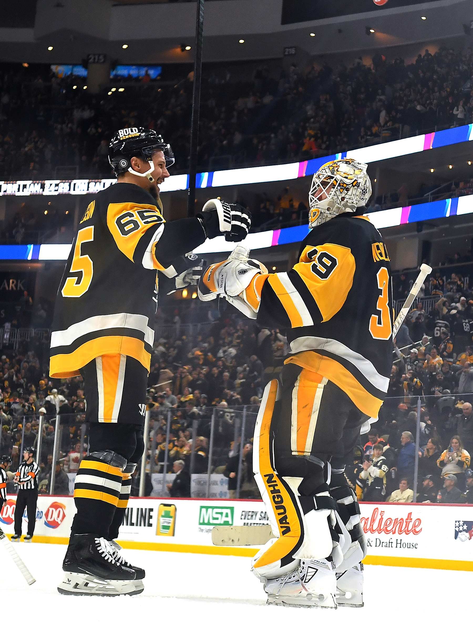 PITTSBURGH, PA - JANUARY 9:  Alex Nedeljkovic #39 celebrates with Erik Karlsson #65 of the Pittsburgh Penguins after defeating the Edmonton Oilers at PPG PAINTS Arena on January 9, 2025 in Pittsburgh, Pennsylvania. (Photo by Joe Sargent/NHLI via Getty Images)