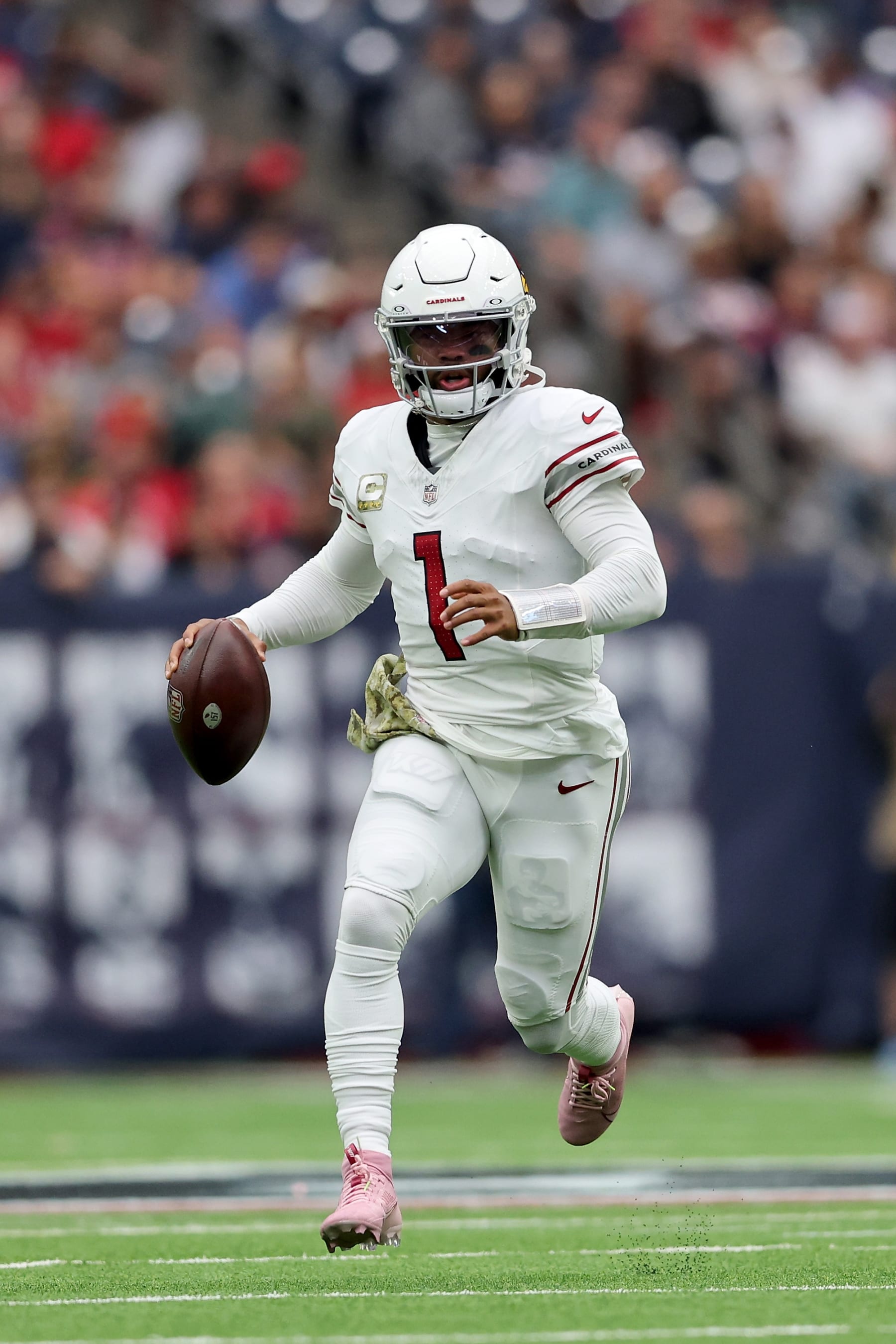 HOUSTON, TEXAS - NOVEMBER 19: Kyler Murray #1 of the Arizona Cardinals scrambles in the second half against the Houston Texans at NRG Stadium on November 19, 2023 in Houston, Texas. (Photo by Tim Warner/Getty Images)