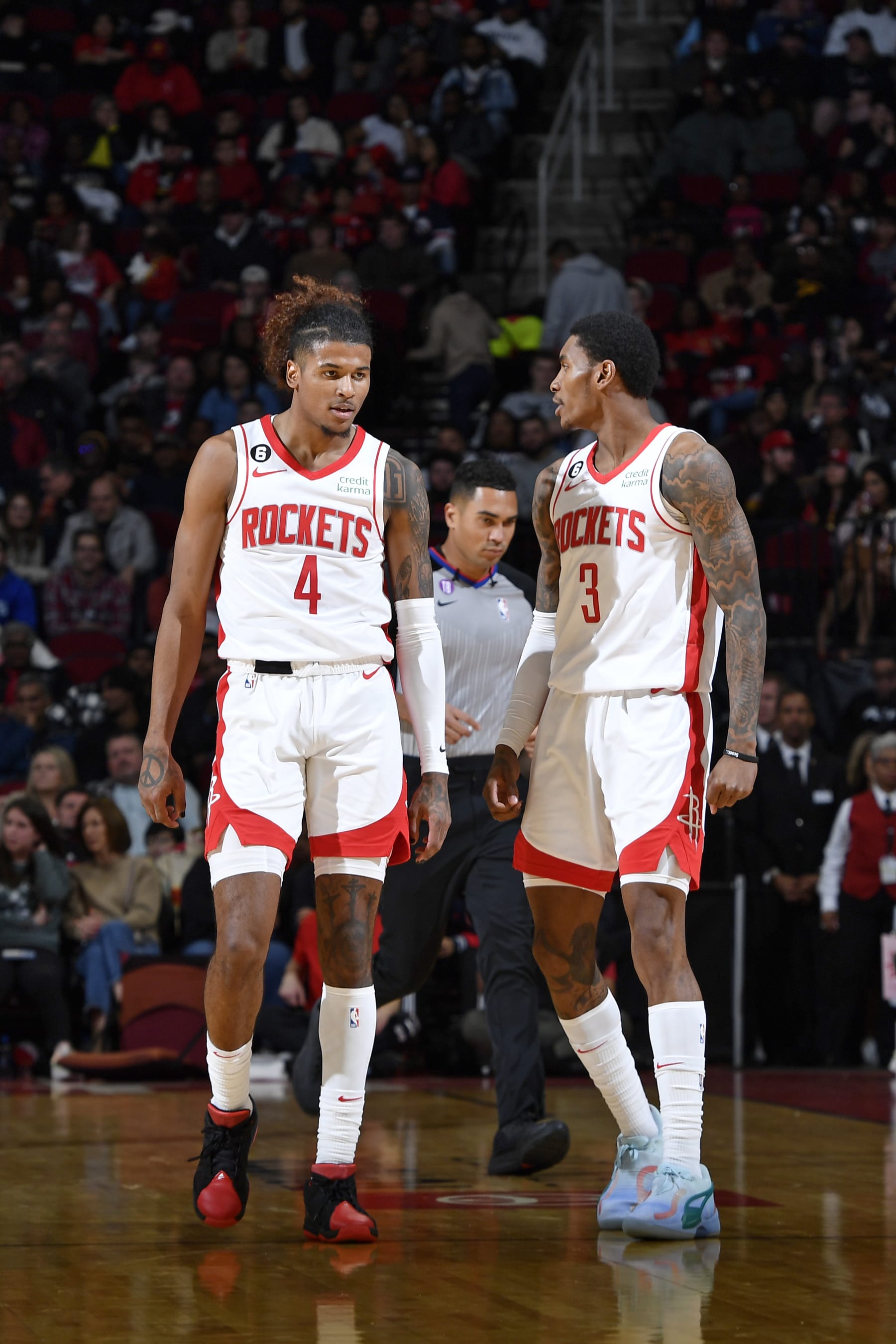 HOUSTON, TX - DECEMBER 17:  Jalen Green #4 and Kevin Porter Jr. #3 of the Houston Rockets talk during the game against the Portland Trail Blazers on December 17, 2022 at the Toyota Center in Houston, Texas. NOTE TO USER: User expressly acknowledges and agrees that, by downloading and or using this photograph, User is consenting to the terms and conditions of the Getty Images License Agreement. Mandatory Copyright Notice: Copyright 2022 NBAE (Photo by Logan Riely/NBAE via Getty Images)