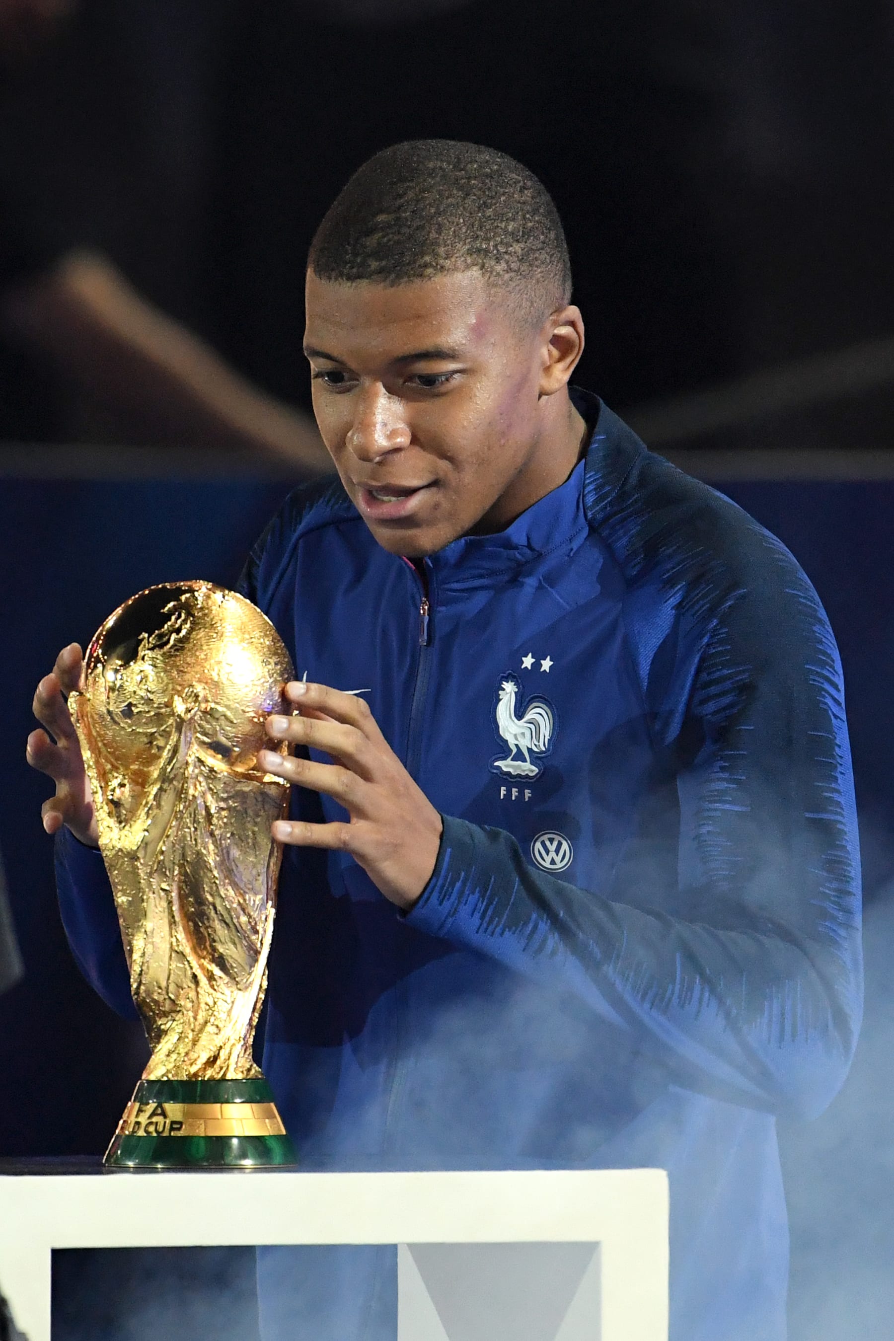 PARIS, FRANCE - SEPTEMBER 09:  Kylian Mbappe celebrates with the World Cup Trophy aftert he UEFA Nations League A group official match between France and Netherlands at Stade de France on September 9, 2018 in Paris, France. This is the first match of the French football team at the Stade de France since their victory in the final of the World Cup in Russia.  (Photo by Frederic Stevens/Getty Images)