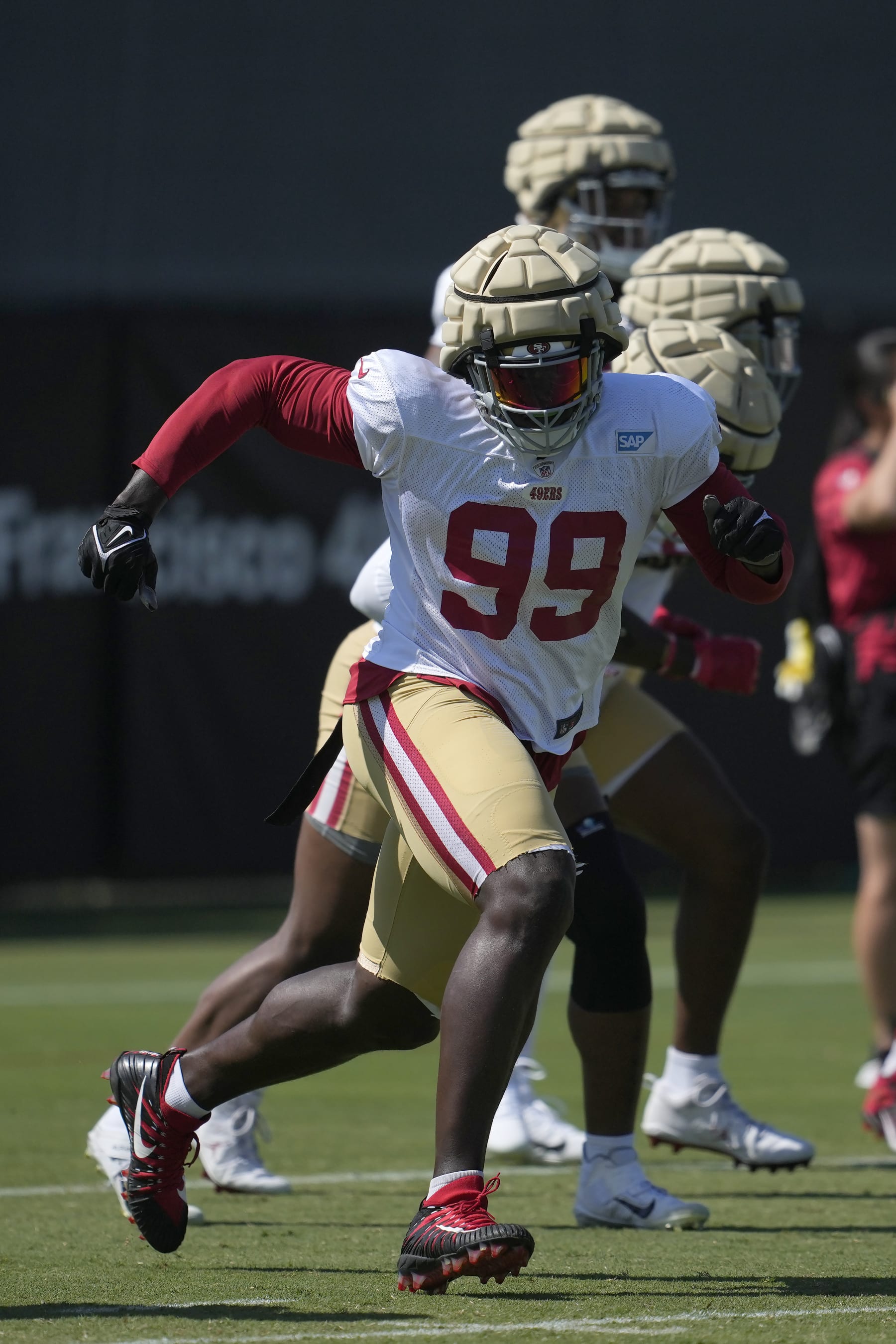 San Francisco 49ers defensive tackle Javon Kinlaw takes part in drills during the NFL team's football training camp in Santa Clara, Calif., Tuesday, Aug. 1, 2023. (AP Photo/Jeff Chiu)