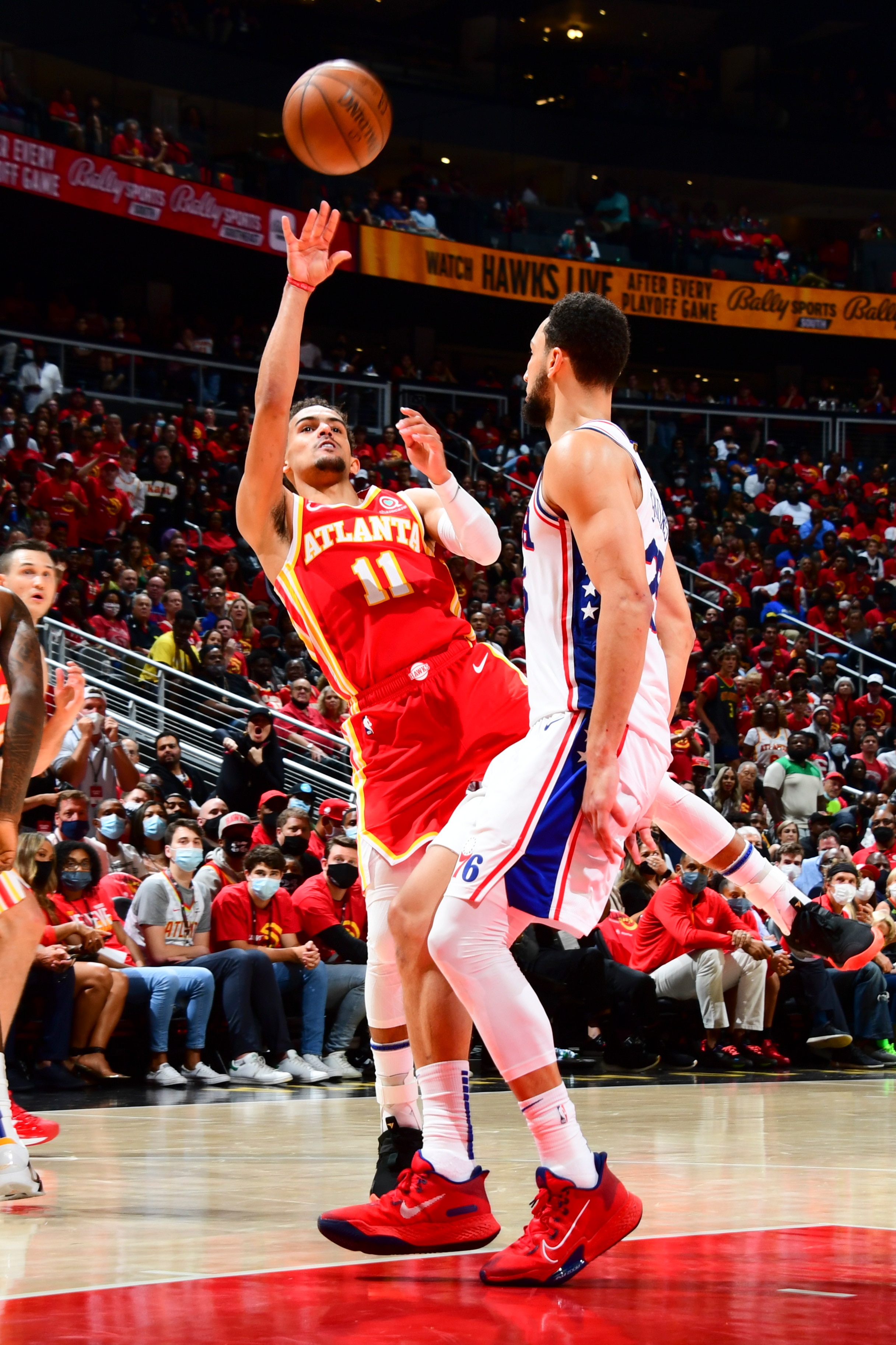 ATLANTA, GA - JUNE 11: Trae Young #11 of the Atlanta Hawks shoots the ball during the game against the Philadelphia 76ers during Round 2, Game 3 of the Eastern Conference Playoffs  on June 11, 2021 at State Farm Arena in Atlanta, Georgia.  NOTE TO USER: User expressly acknowledges and agrees that, by downloading and/or using this Photograph, user is consenting to the terms and conditions of the Getty Images License Agreement. Mandatory Copyright Notice: Copyright 2021 NBAE (Photo by Scott Cunningham/NBAE via Getty Images)