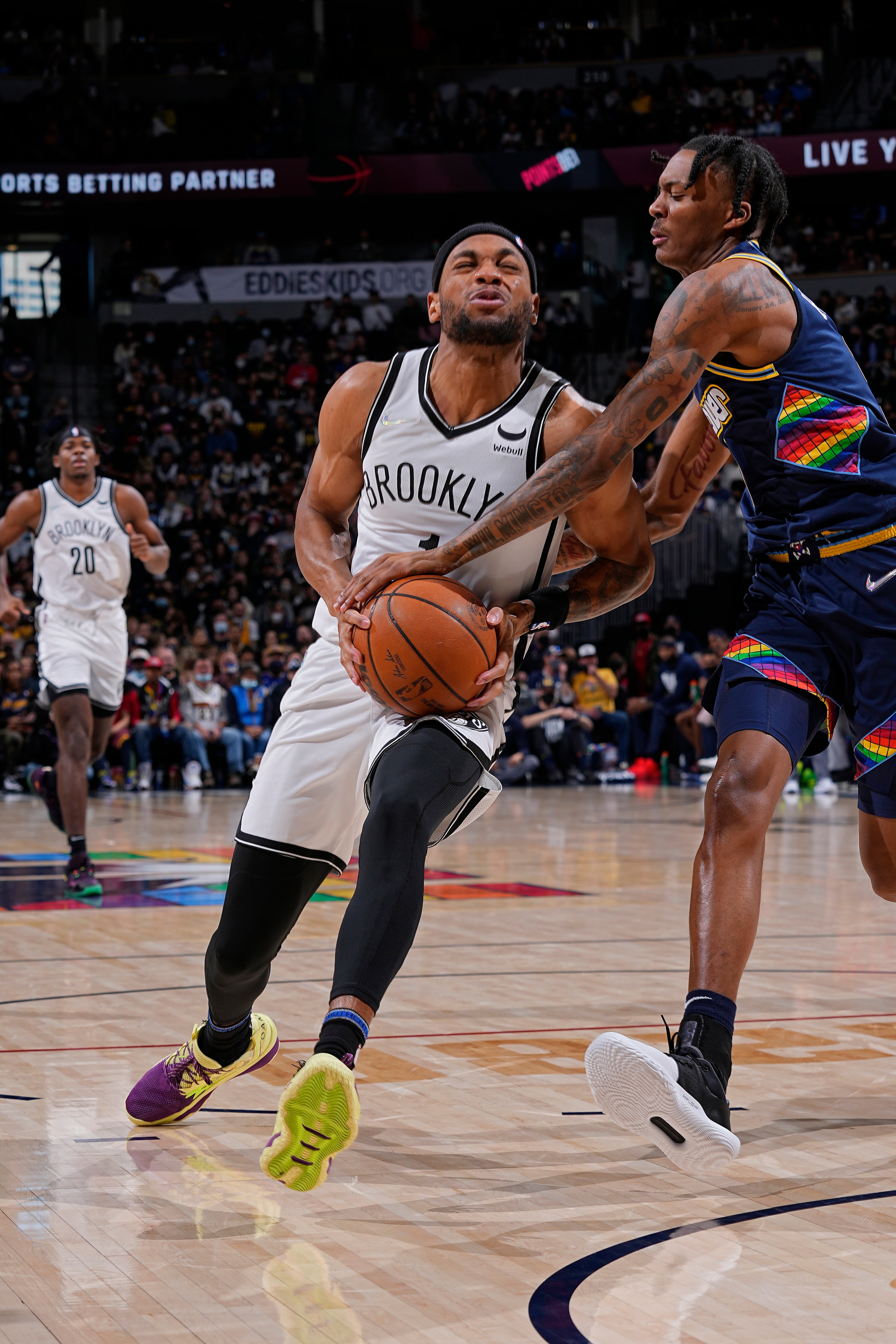 DENVER, CO - FEBRUARY 6:  Bruce Brown #1 of the Brooklyn Nets drives to the basket during the game against the Denver Nuggets on February 6, 2022 at the Ball Arena in Denver, Colorado. NOTE TO USER: User expressly acknowledges and agrees that, by downloading and/or using this Photograph, user is consenting to the terms and conditions of the Getty Images License Agreement. Mandatory Copyright Notice: Copyright 2022 NBAE (Photo by Bart Young/NBAE via Getty Images)