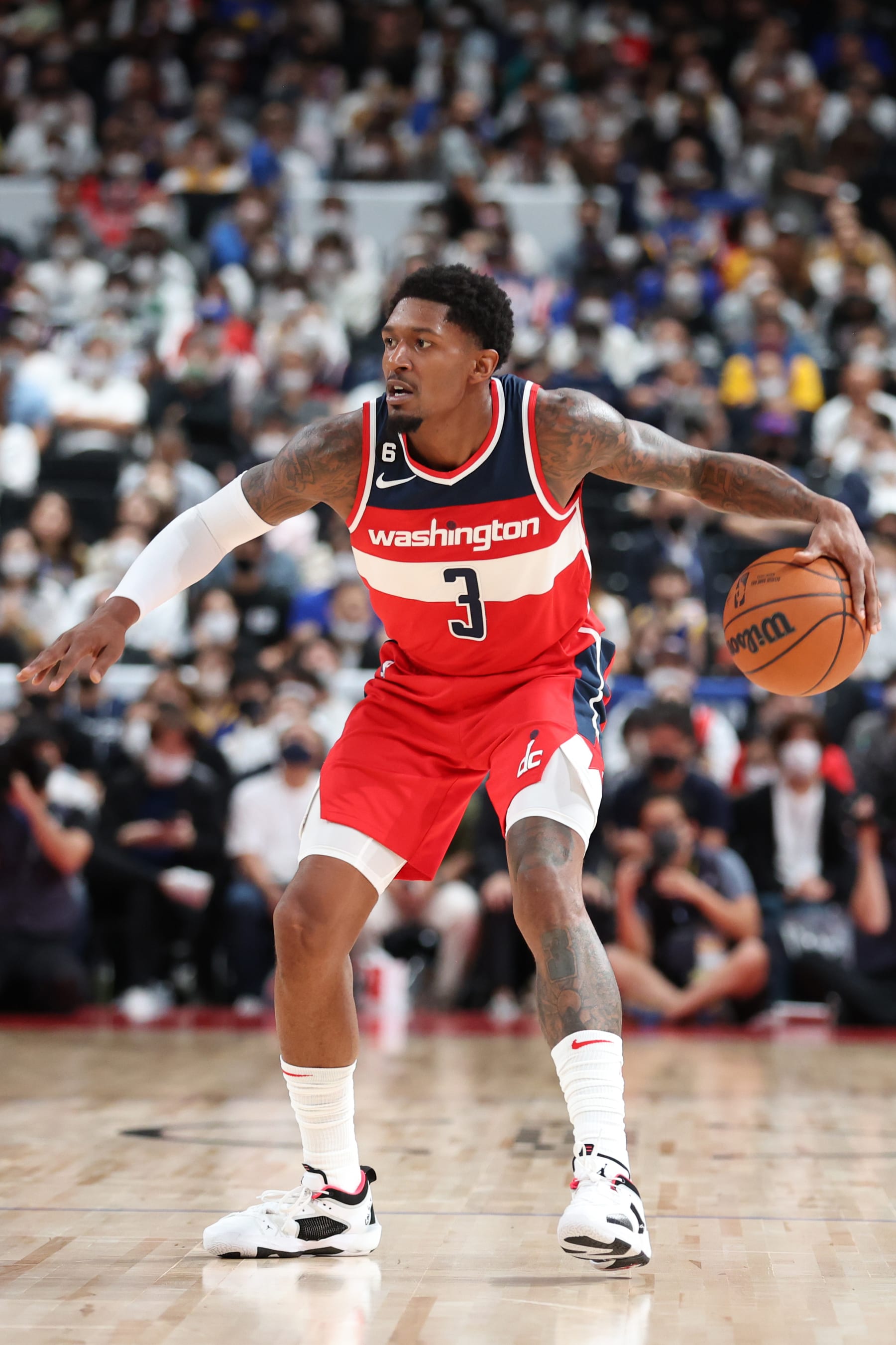 SAITAMA, JAPAN - SEPTEMBER 30: Bradley Beal #3 of the Washington Wizards dribbles the ball during the game against the Golden State Warriors as part of the 2022 NBA Japan Games on September 30, 2022 at Saitama Super Arena in Saitama, Japan . NOTE TO USER: User expressly acknowledges and agrees that, by downloading and or using this Photograph, user is consenting to the terms and conditions of the Getty Images License Agreement. Mandatory Copyright Notice: Copyright 2022 NBAE (Photo by Stephen Gosling/NBAE via Getty Images)
