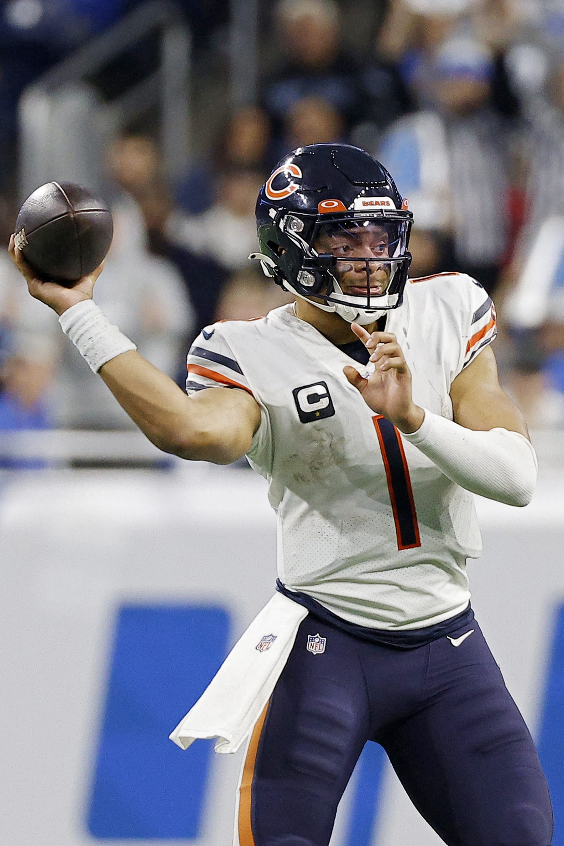 DETROIT, MICHIGAN - JANUARY 01: Justin Fields #1 of the Chicago Bears throws a pass in the second half of a game against the Detroit Lions at Ford Field on January 01, 2023 in Detroit, Michigan. (Photo by Mike Mulholland/Getty Images)