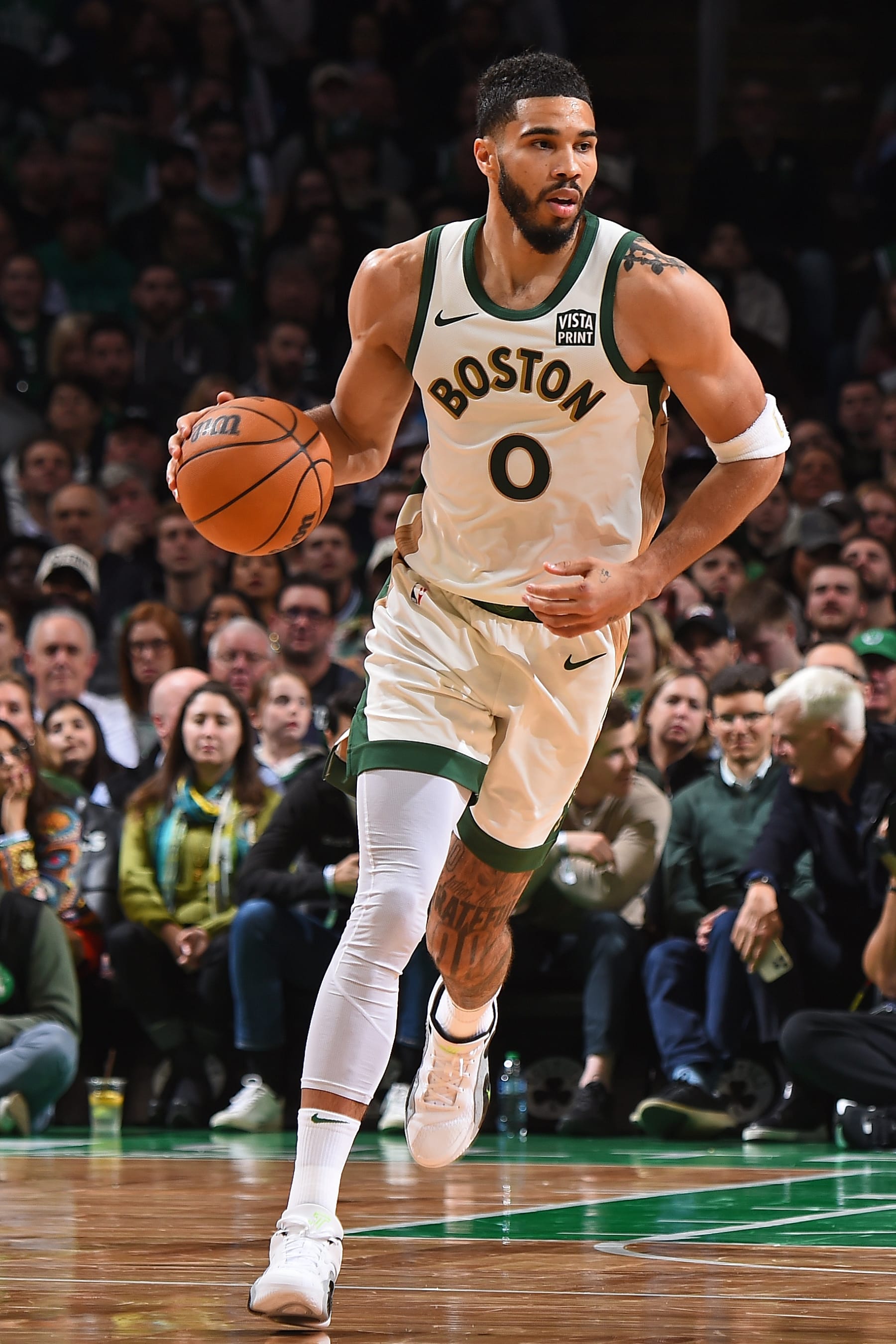 BOSTON, MA - FEBRUARY 27: Jayson Tatum #0 of the Boston Celtics brings the ball up court during the game against the Philadelphia 76ers on February 27, 2024 at the TD Garden in Boston, Massachusetts. NOTE TO USER: User expressly acknowledges and agrees that, by downloading and or using this photograph, User is consenting to the terms and conditions of the Getty Images License Agreement. Mandatory Copyright Notice: Copyright 2024 NBAE  (Photo by Brian Babineau/NBAE via Getty Images)