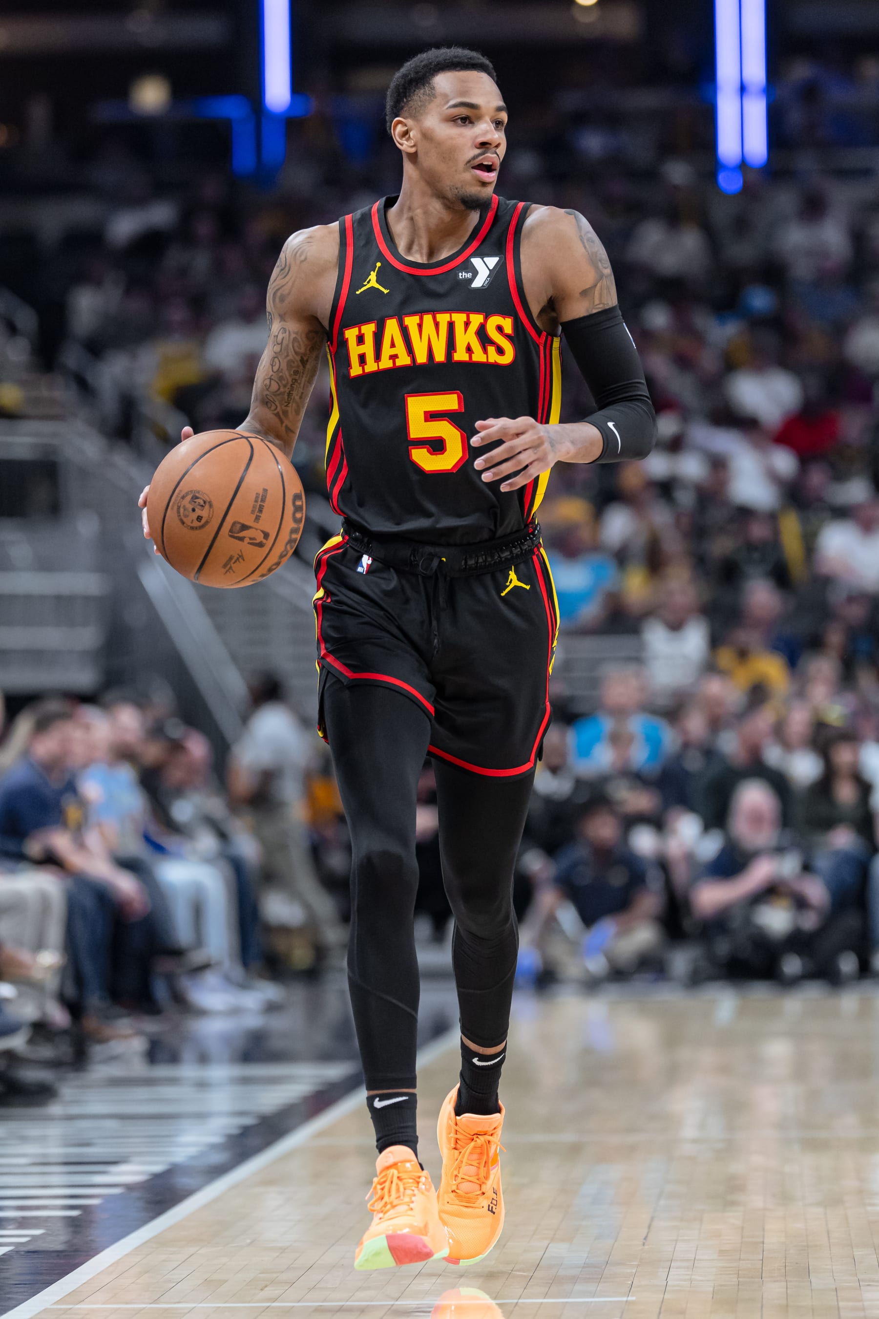 INDIANAPOLIS, INDIANA - APRIL 14: Dejounte Murray #5 of the Atlanta Hawks brings the ball up court during the game against the Indiana Pacers at Gainbridge Fieldhouse on April 14, 2024 in Indianapolis, Indiana. NOTE TO USER: User expressly acknowledges and agrees that, by downloading and or using this photograph, User is consenting to the terms and conditions of the Getty Images License Agreement. (Photo by Michael Hickey/Getty Images)