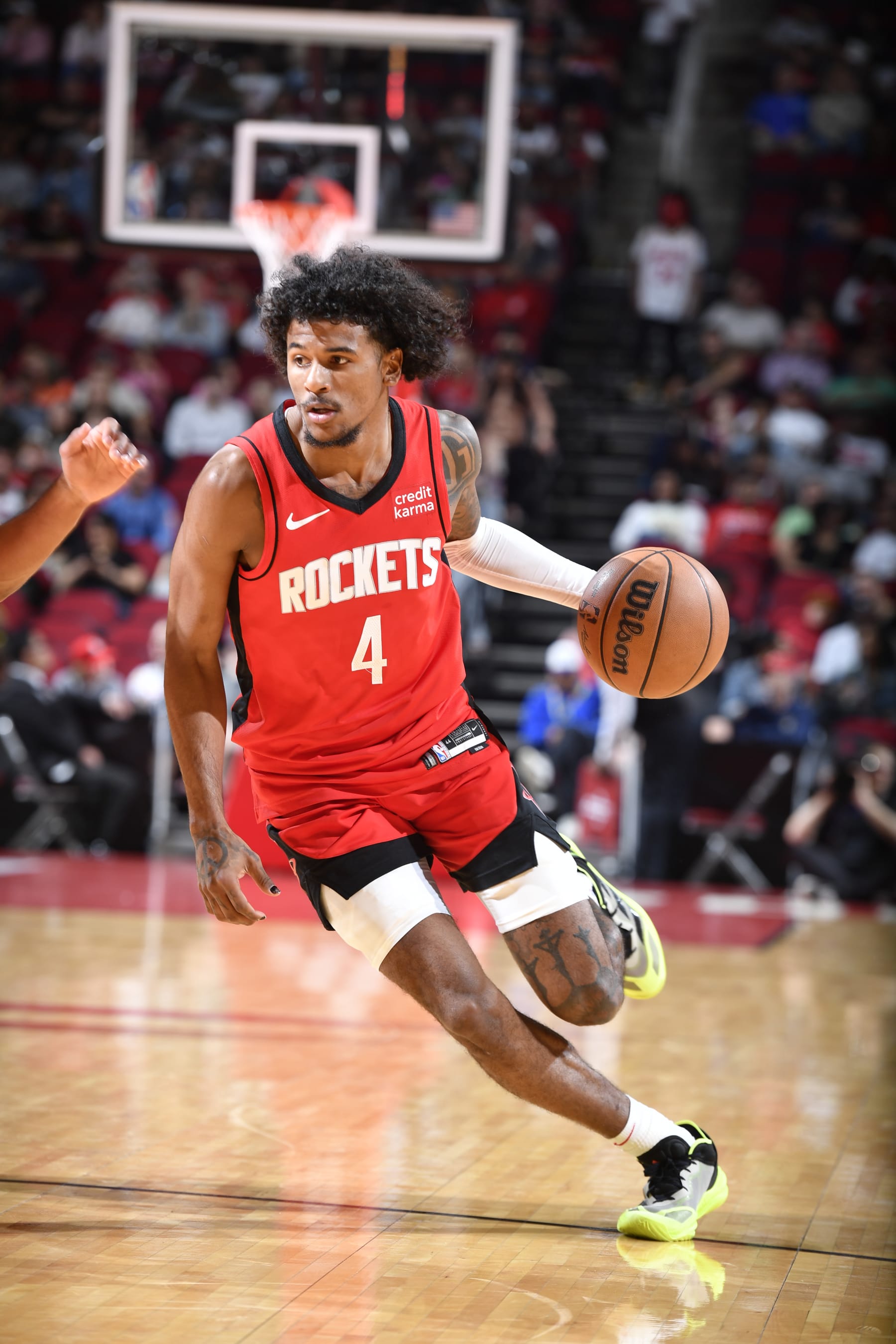 HOUSTON, TX - MARCH 25: Jalen Green #4 of the Houston Rockets handles the ball during the game against the Portland Trail Blazers on March 25, 2024 at the Toyota Center in Houston, Texas. NOTE TO USER: User expressly acknowledges and agrees that, by downloading and or using this photograph, User is consenting to the terms and conditions of the Getty Images License Agreement. Mandatory Copyright Notice: Copyright 2024 NBAE (Photo by Logan Riely/NBAE via Getty Images)