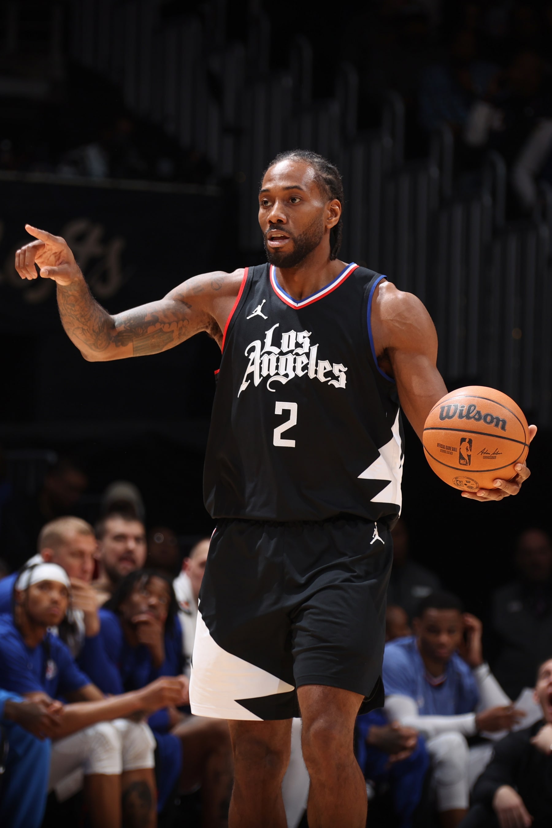 WASHINGTON, DC -  JANUARY 31:  Kawhi Leonard #2 of the LA Clippers handles the ball during the game  on January 31, 2024 at Capital One Arena in Washington, DC. NOTE TO USER: User expressly acknowledges and agrees that, by downloading and or using this Photograph, user is consenting to the terms and conditions of the Getty Images License Agreement. Mandatory Copyright Notice: Copyright 2024 NBAE (Photo by Stephen Gosling/NBAE via Getty Images)